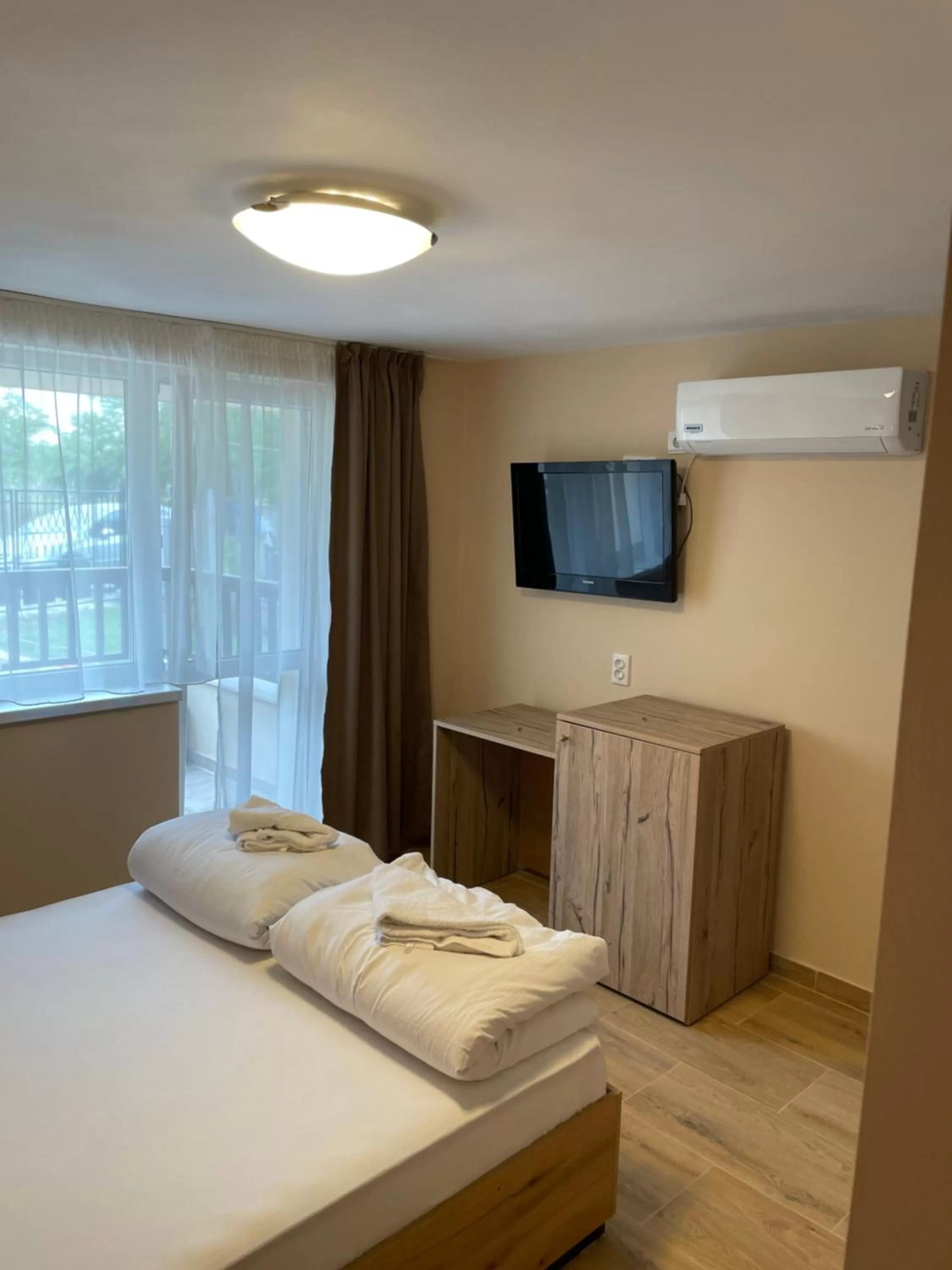 Bed in Family Hotel Malibu