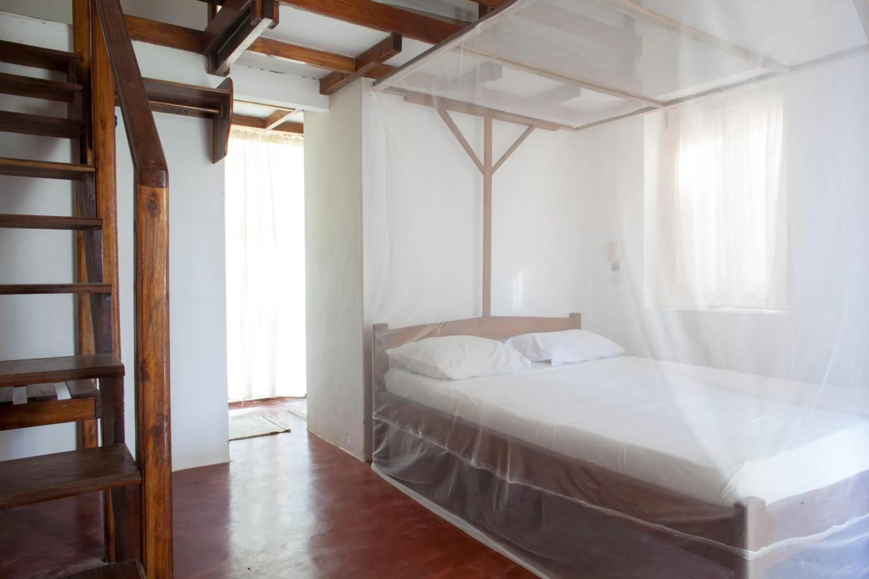 Bed in Auberge de Grand Popo