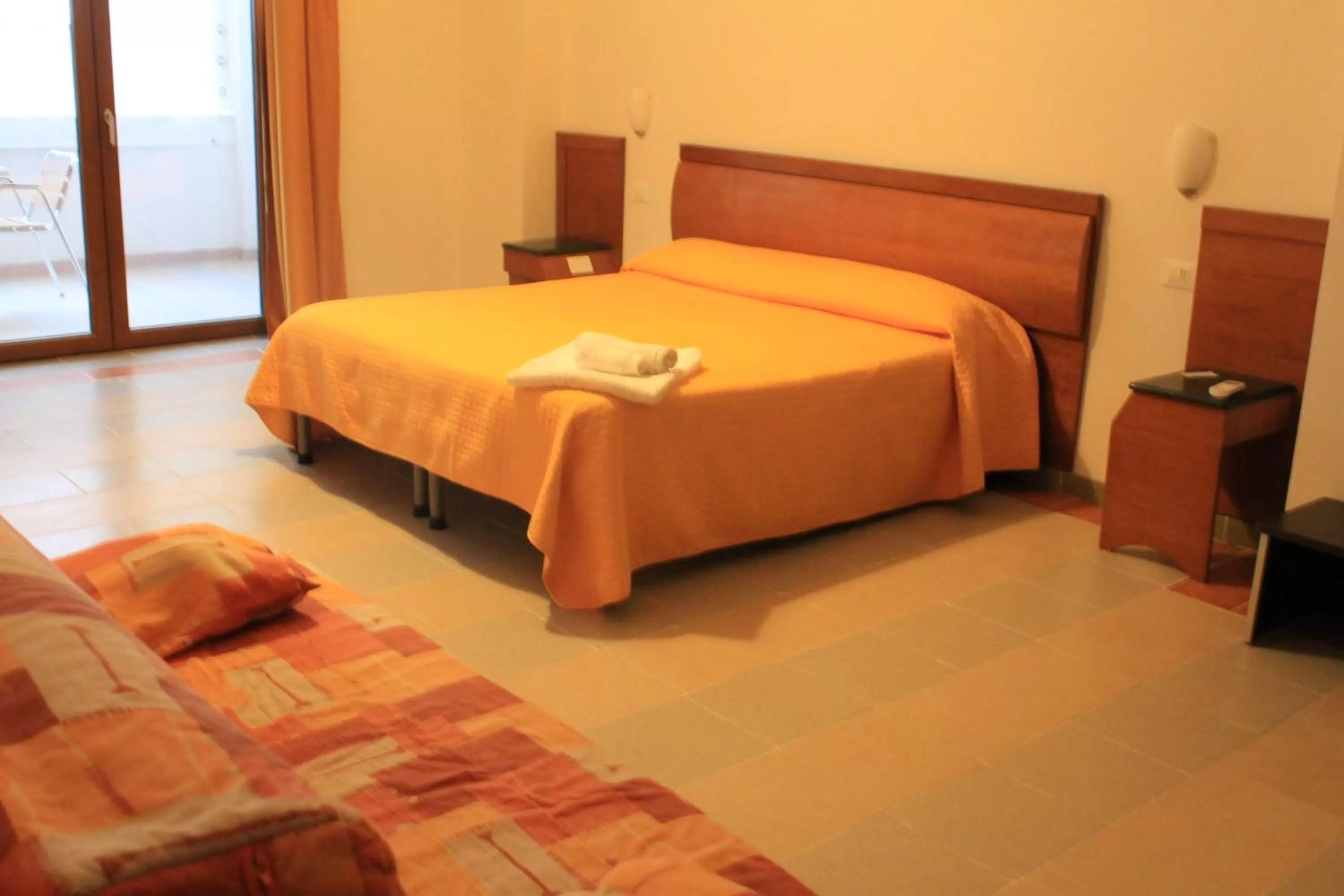 Bed in B&B Palazzo Manfredi Vieste, Fronte mare con Parcheggio