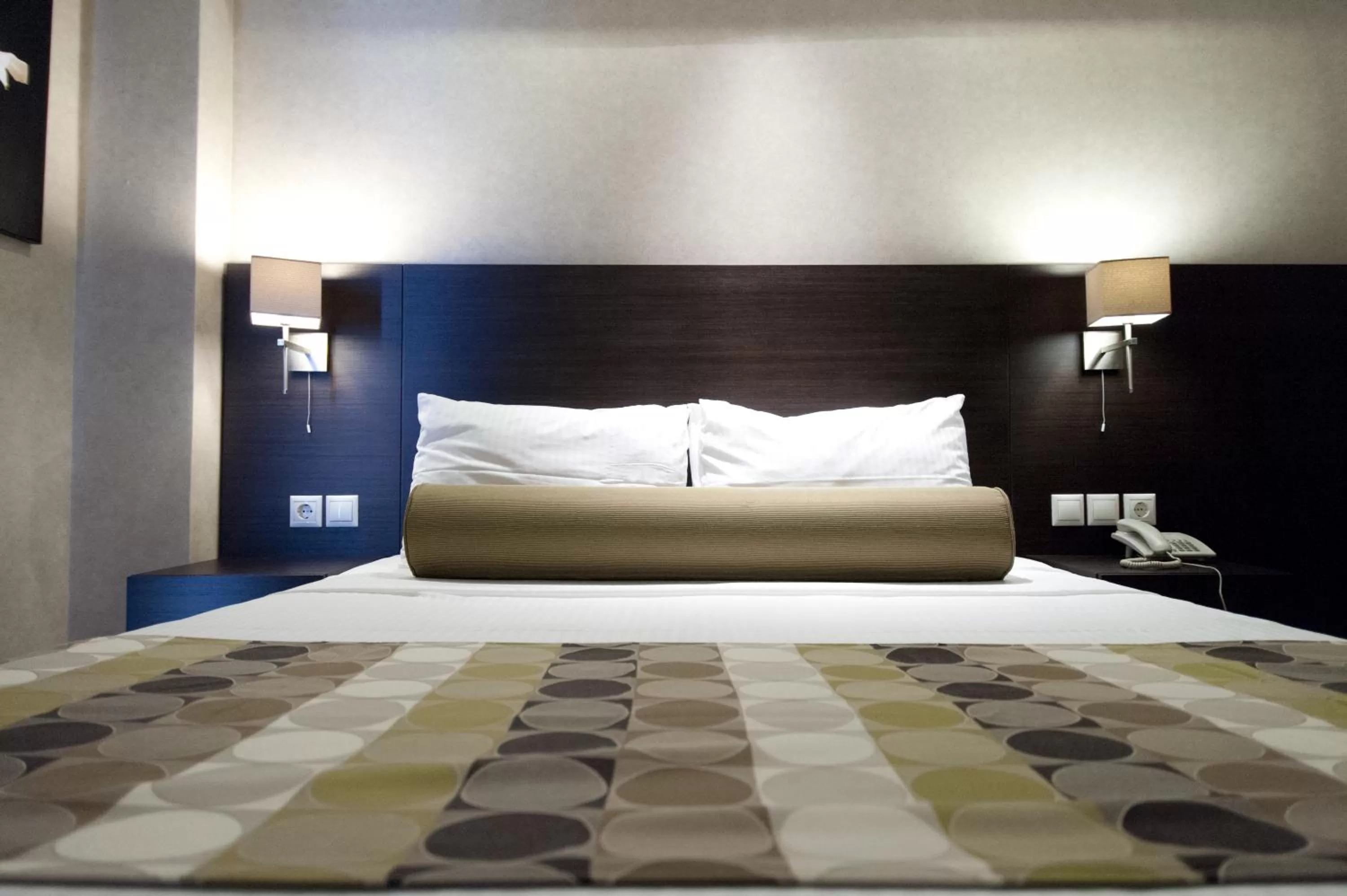 Bed in Nefeli Hotel Alimos