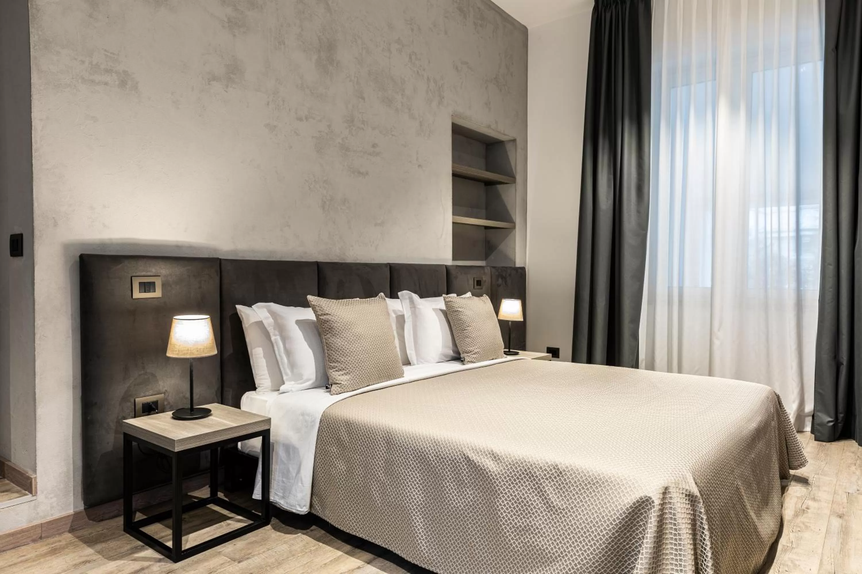 Bed in Corso 84 Luxury Suites