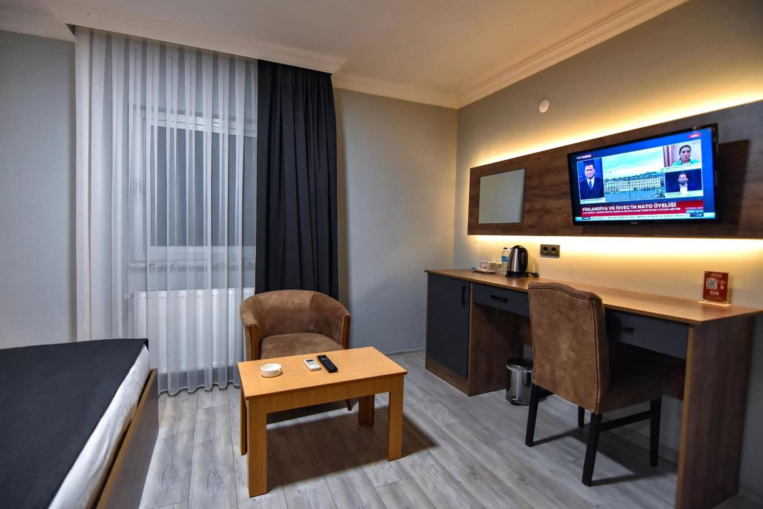 TV and multimedia, TV/Entertainment Center in Sandal Otel