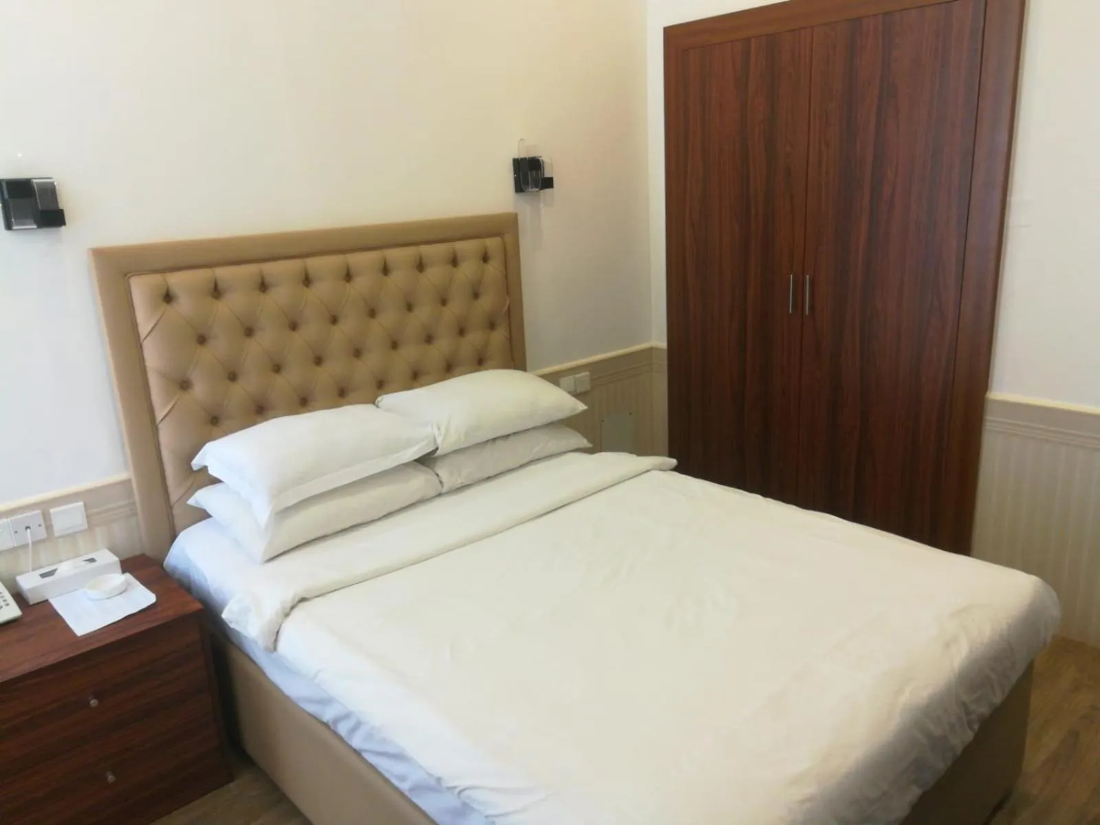 Bed in Royal Residence Hotel Apartments