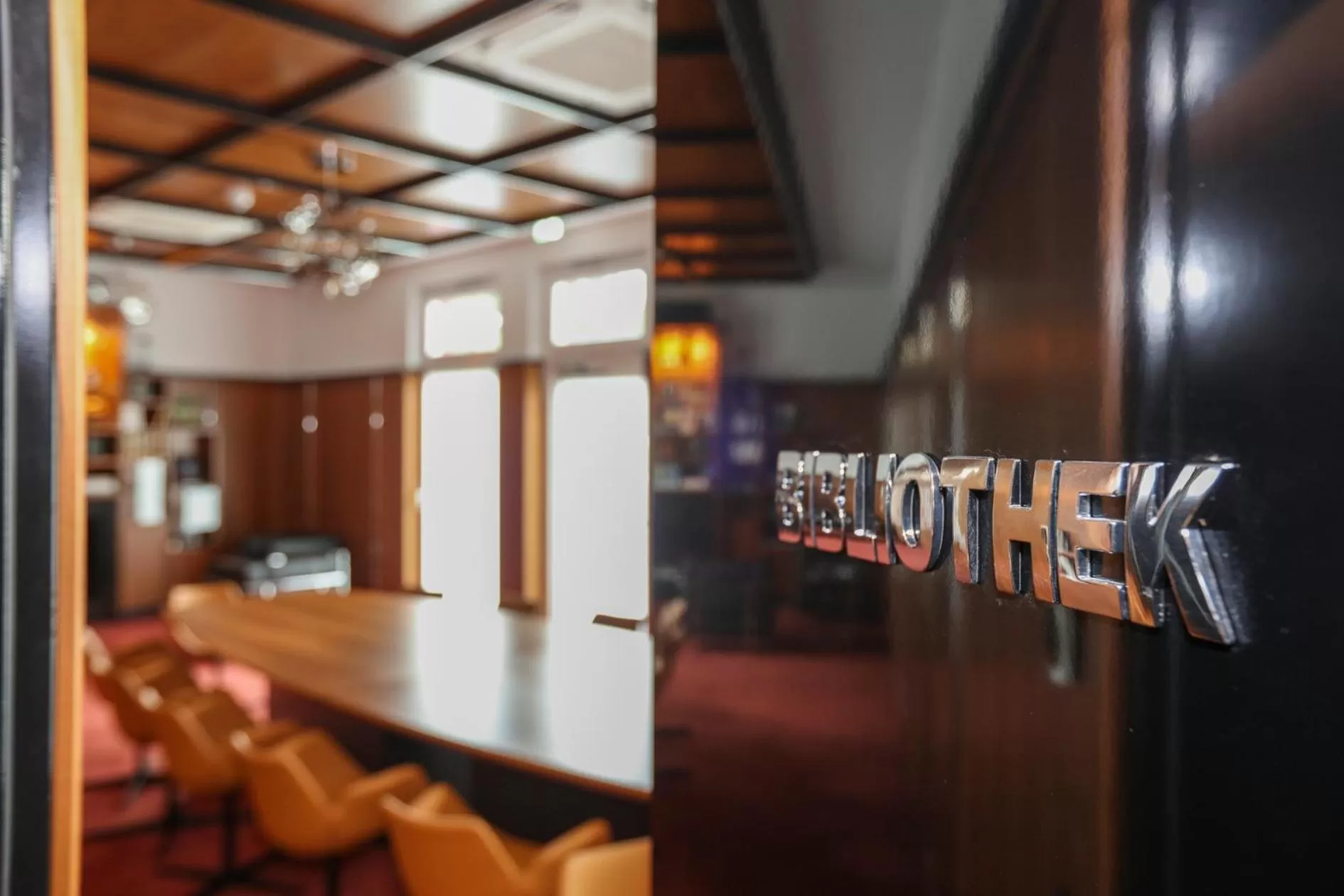 Library in The Bridgge Grand Boutique Hotel