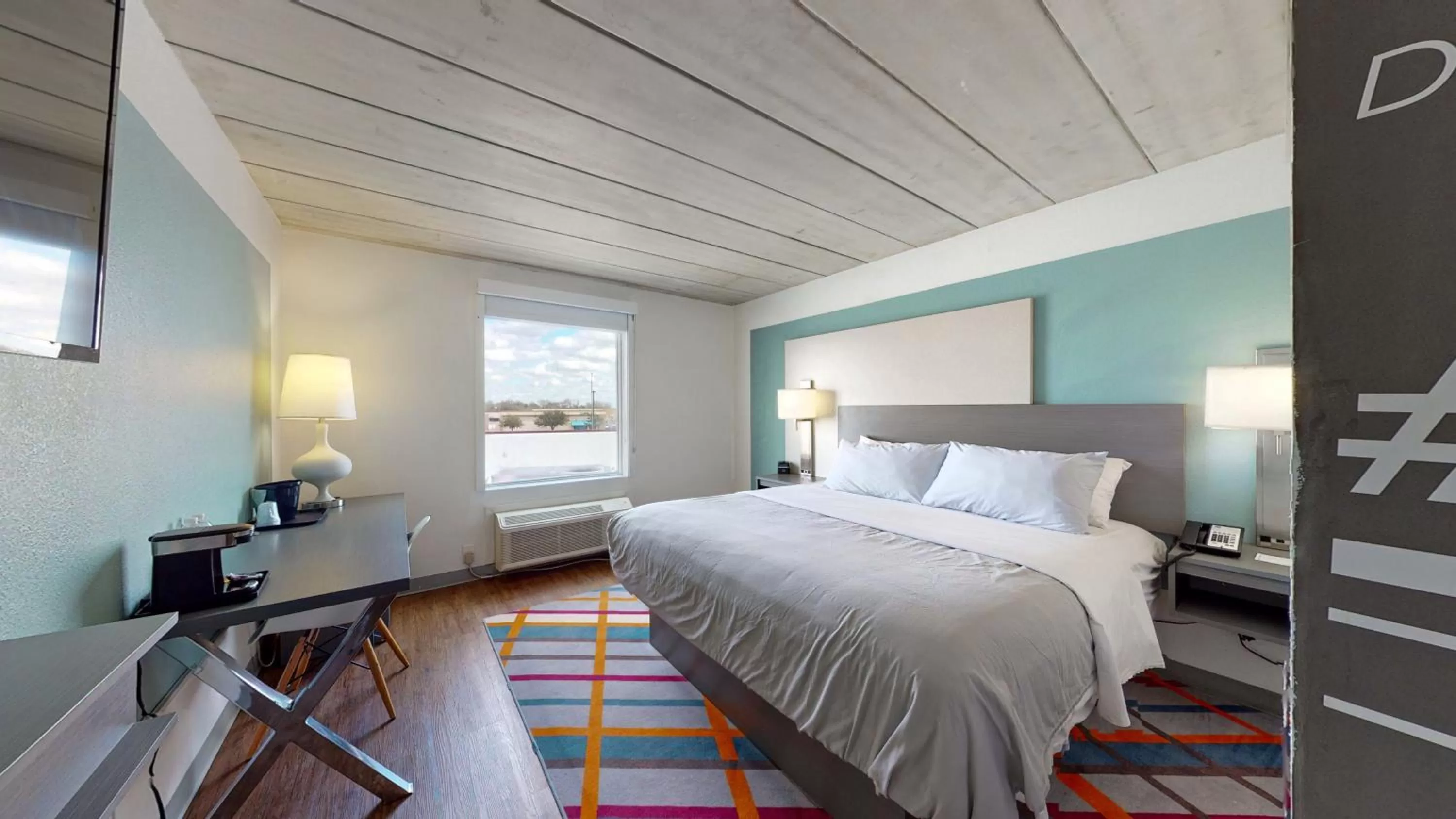 Bedroom, Bed in voco College Station Aggieland by IHG