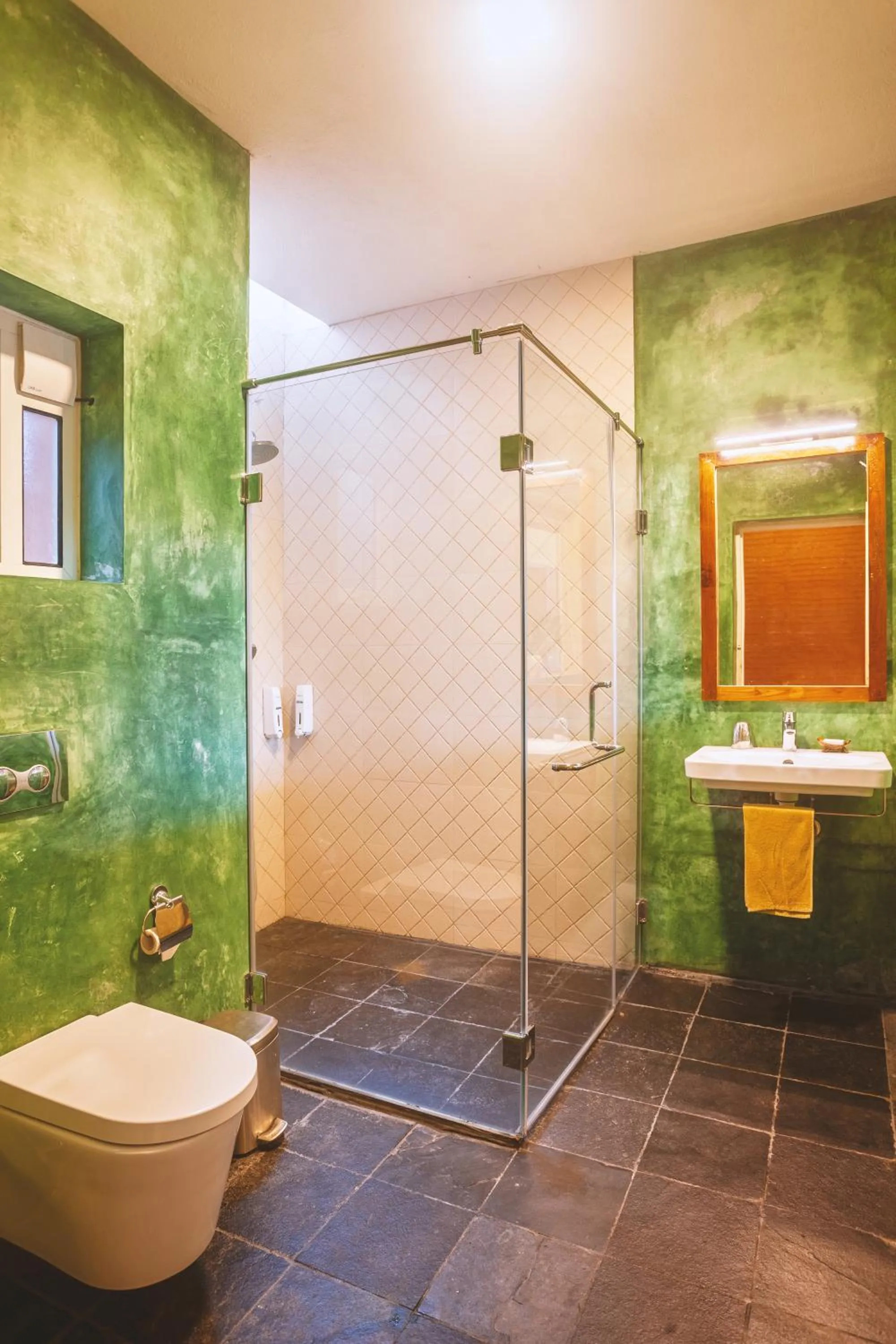 Bathroom in AMARA AYURVEDA RETREAT- Overlooking Evergreen Western Ghats an ecologically sustainable living space in Kovalam