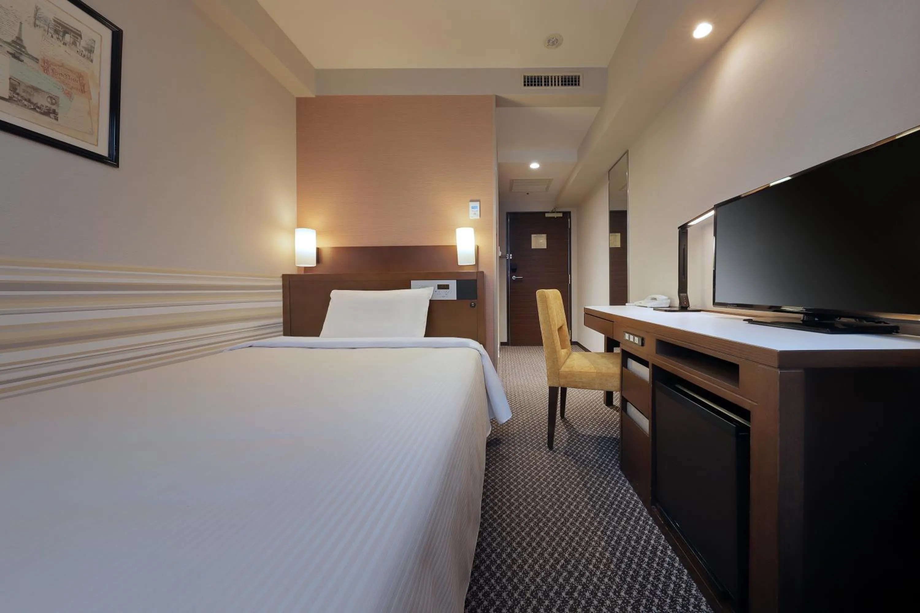 Bed in Keio Presso Inn Shinjuku