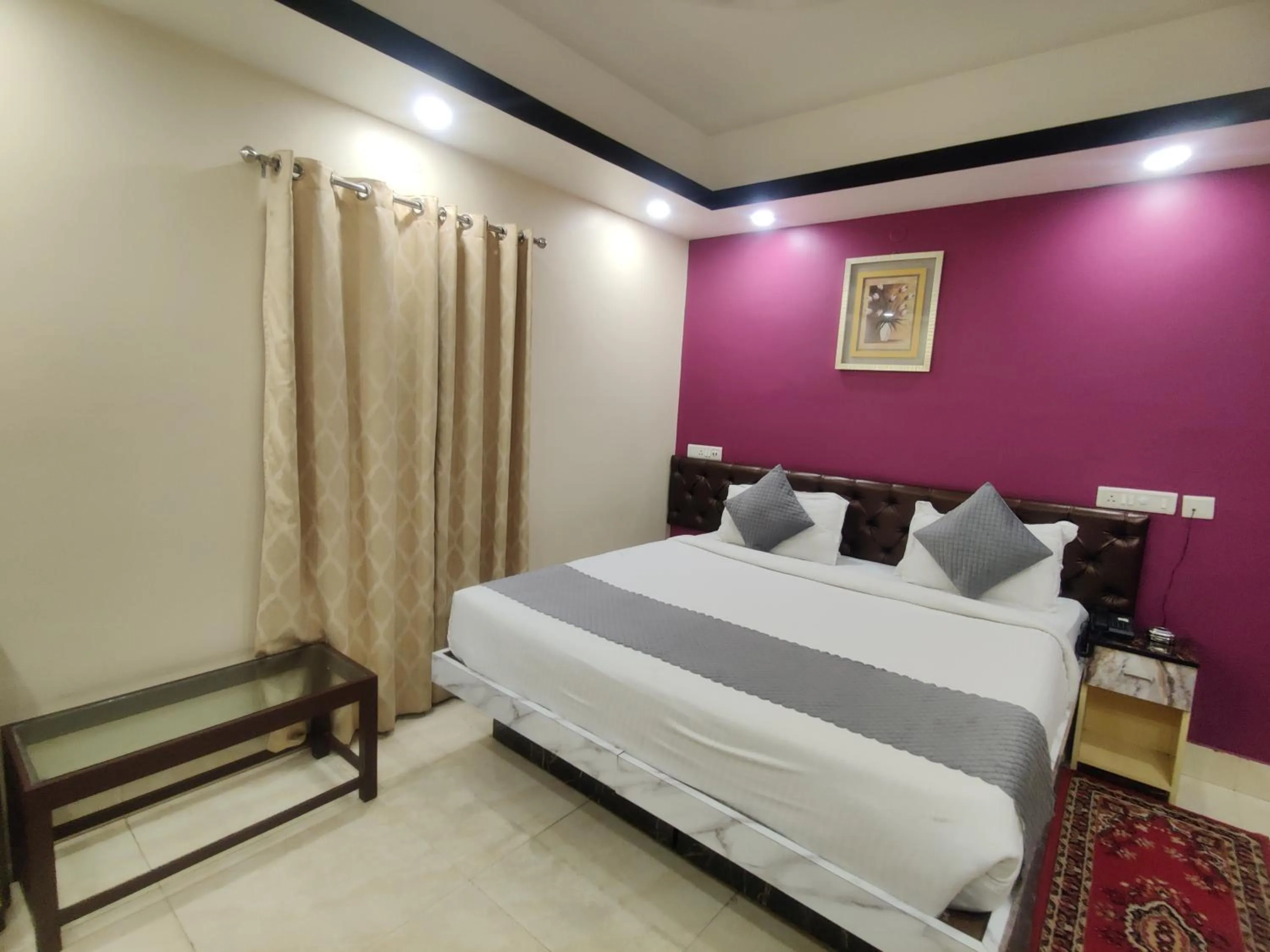 Bedroom in Hotel Swastik Regency