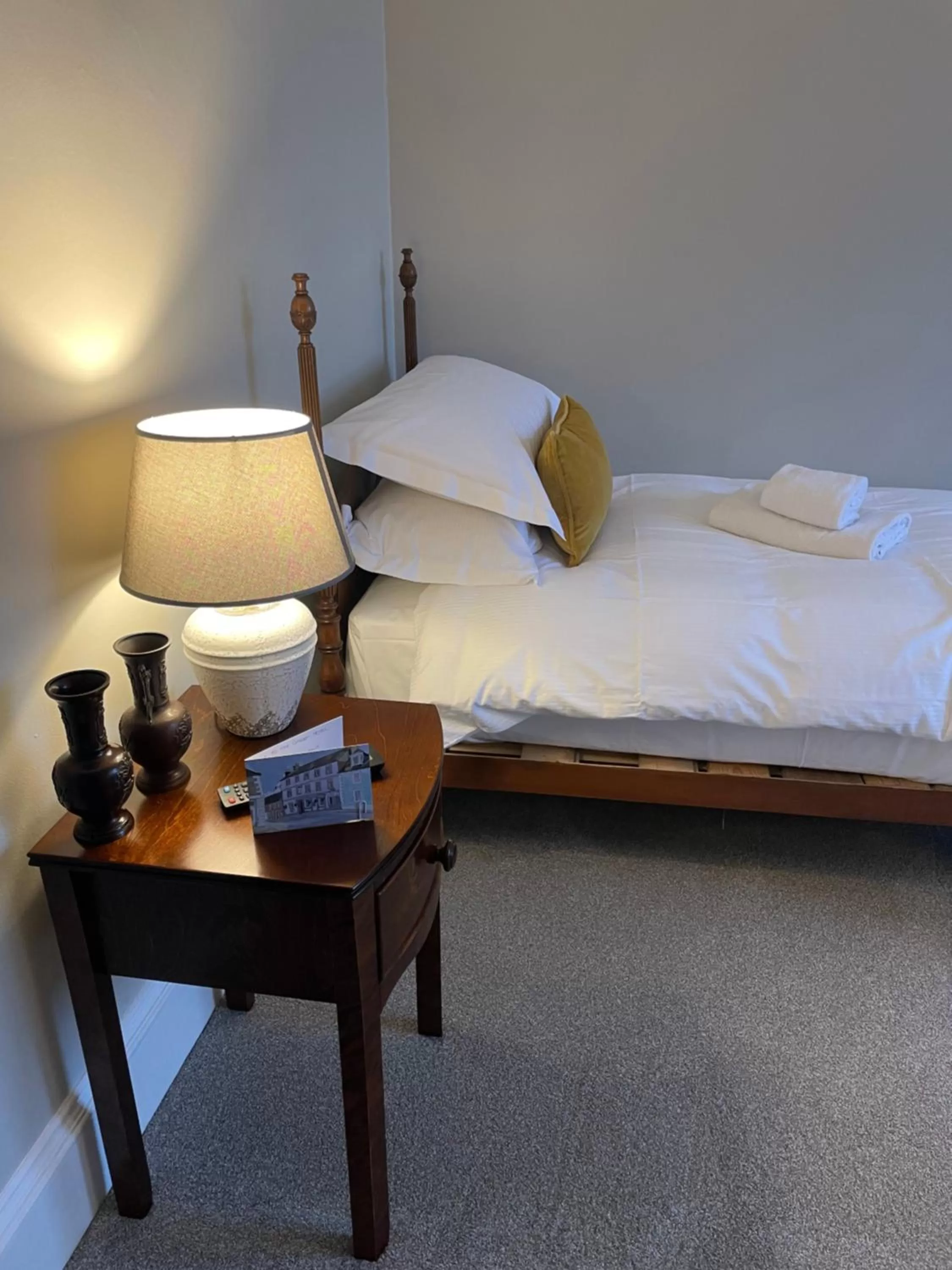 Bed in The Garret Hotel