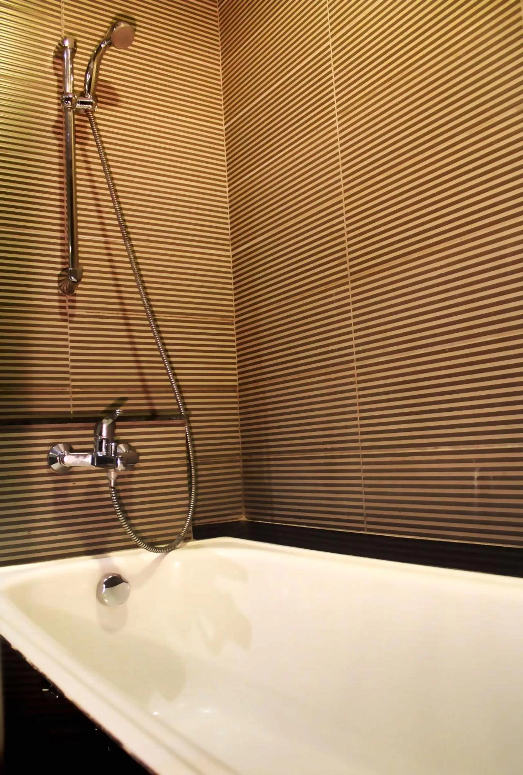 Bathroom in 100 Sunset Kuta Hotel & Ballroom