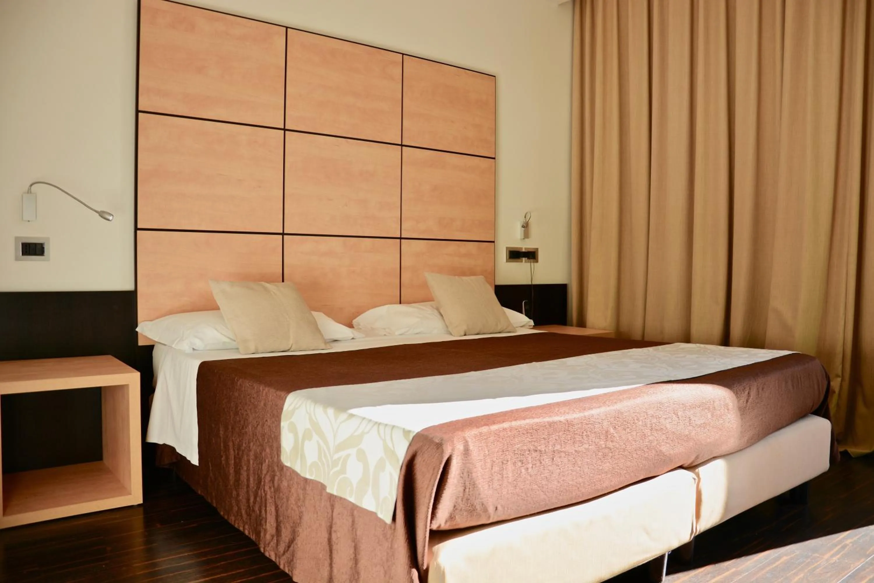 Bed in Hotel Cimarosa