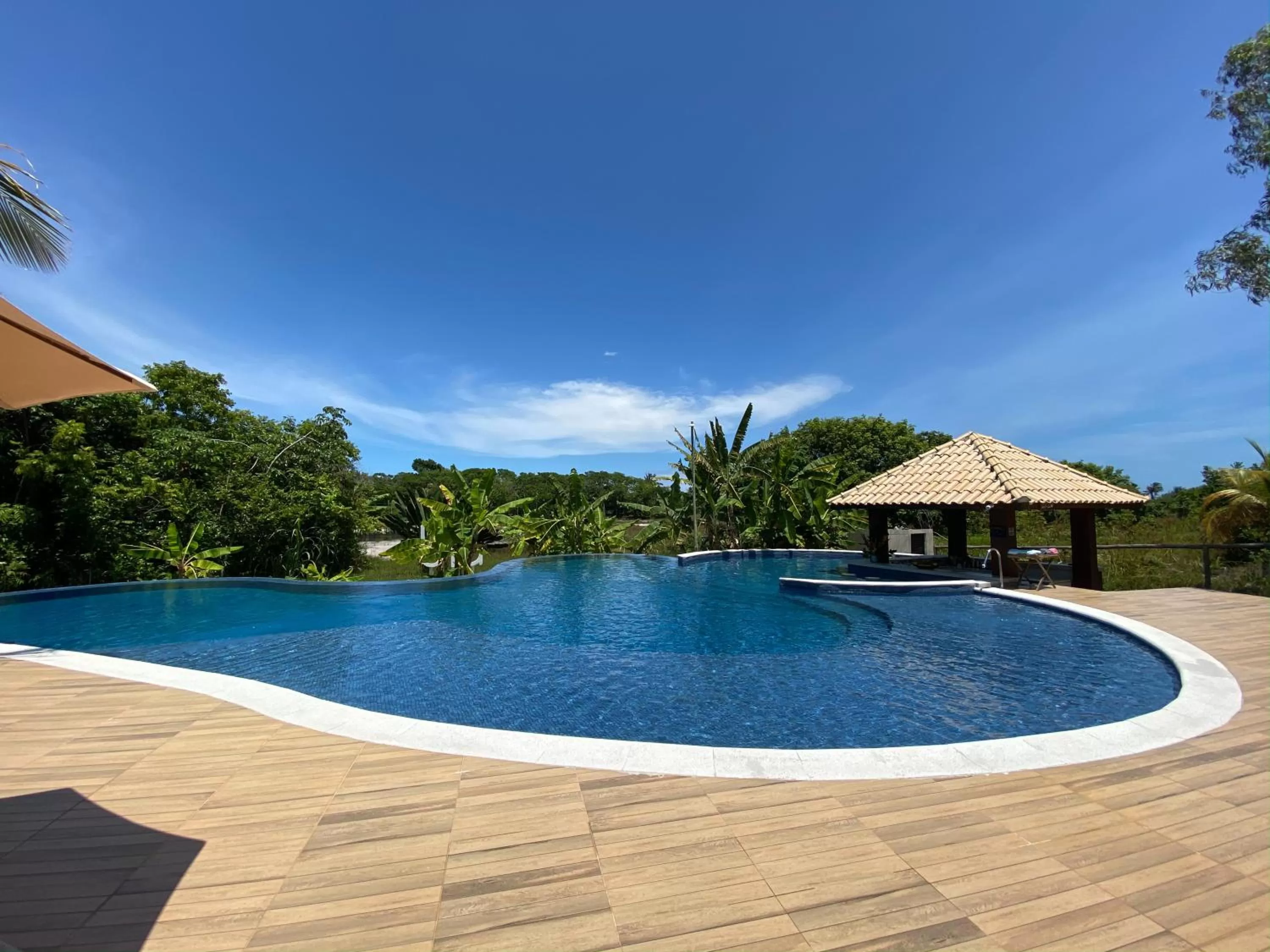 Swimming pool in Pousada Sitio da Bia