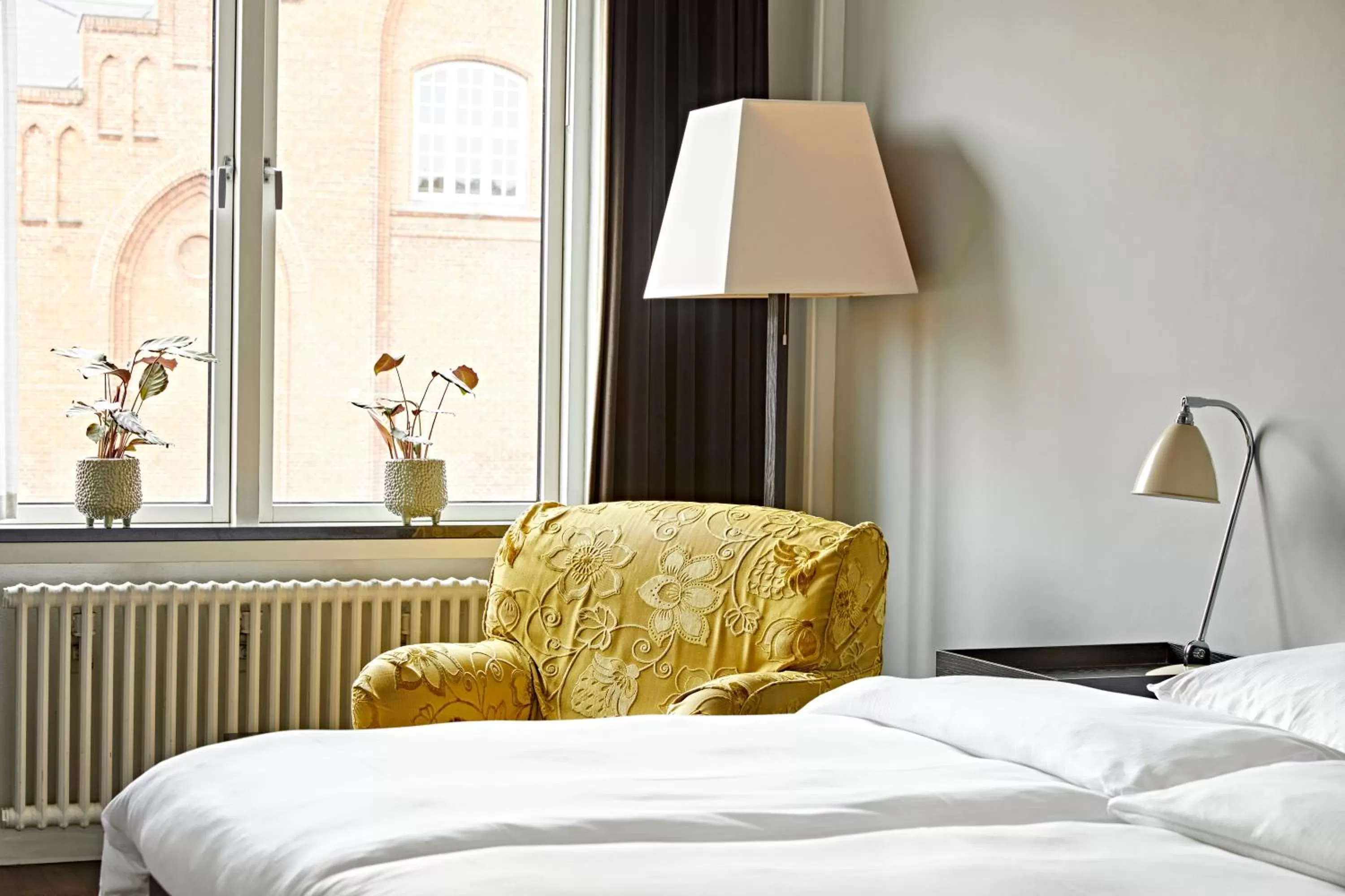 Bed in First Hotel Grand