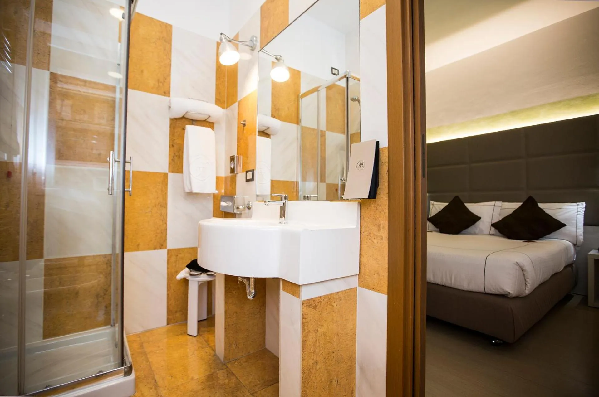 Bathroom, Bed in Agape Hotel AA Hotels