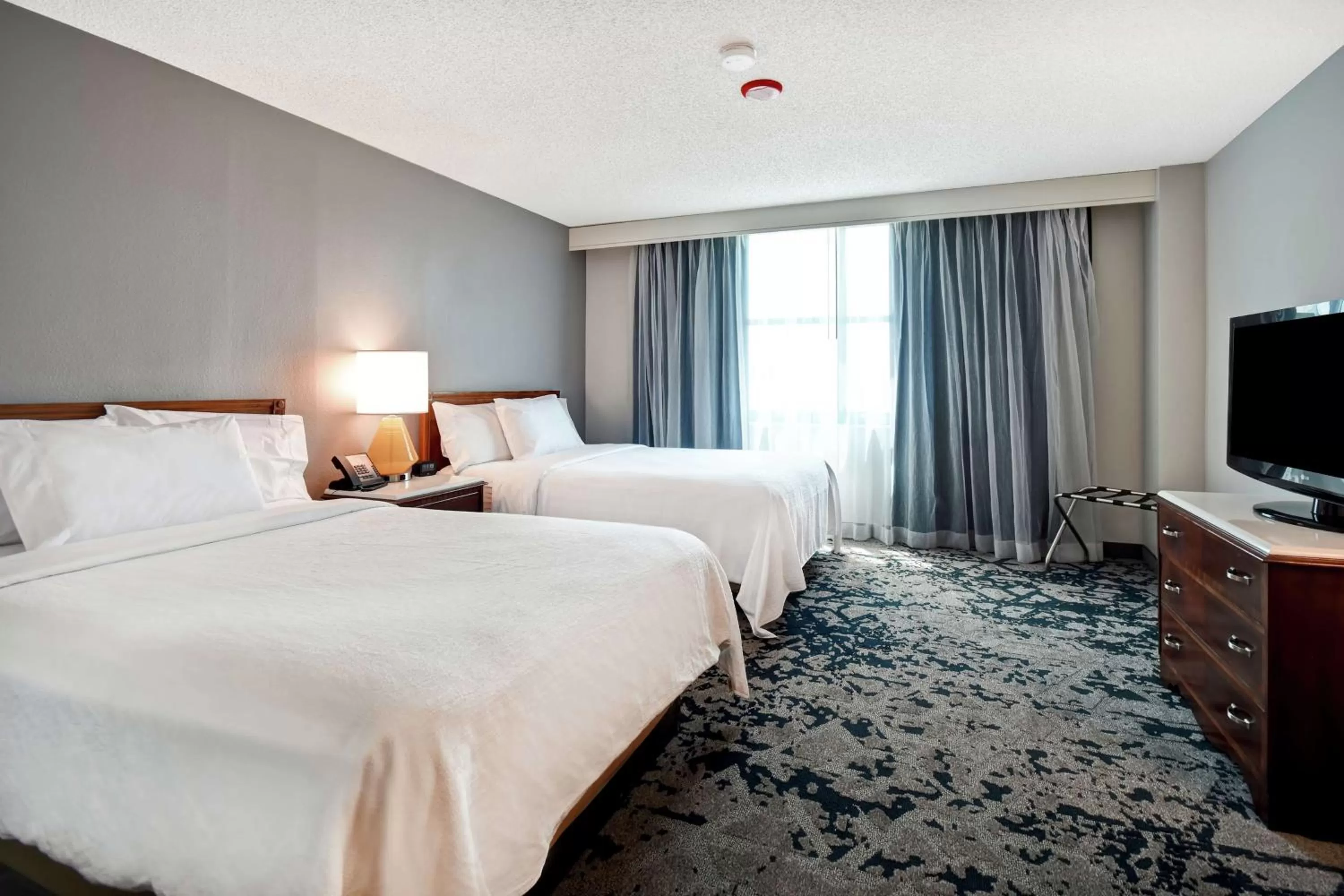 Bed in Embassy Suites Montgomery - Hotel & Conference Center