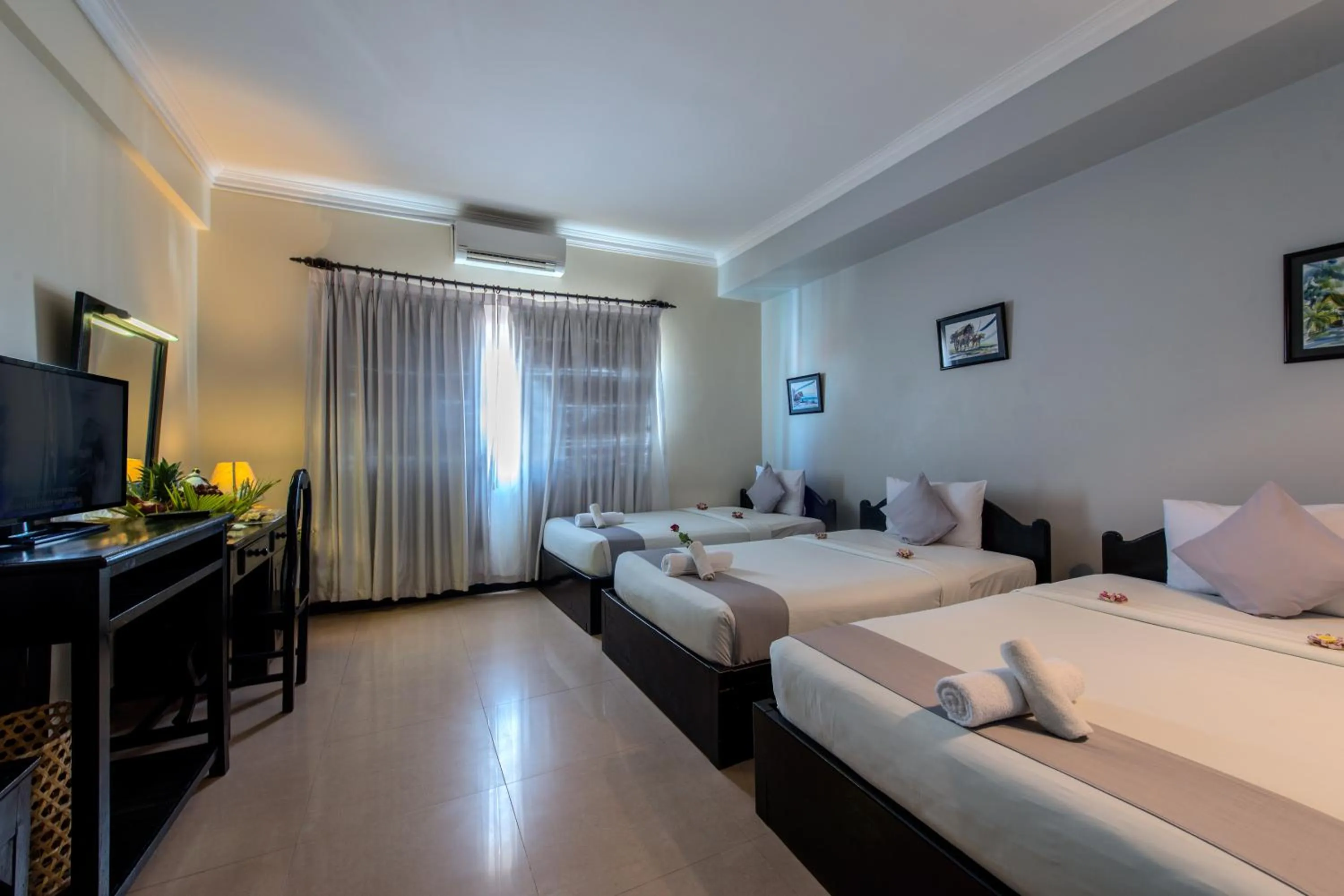 Photo of the whole room, Bed in Angkor Panoramic Boutique Hotel