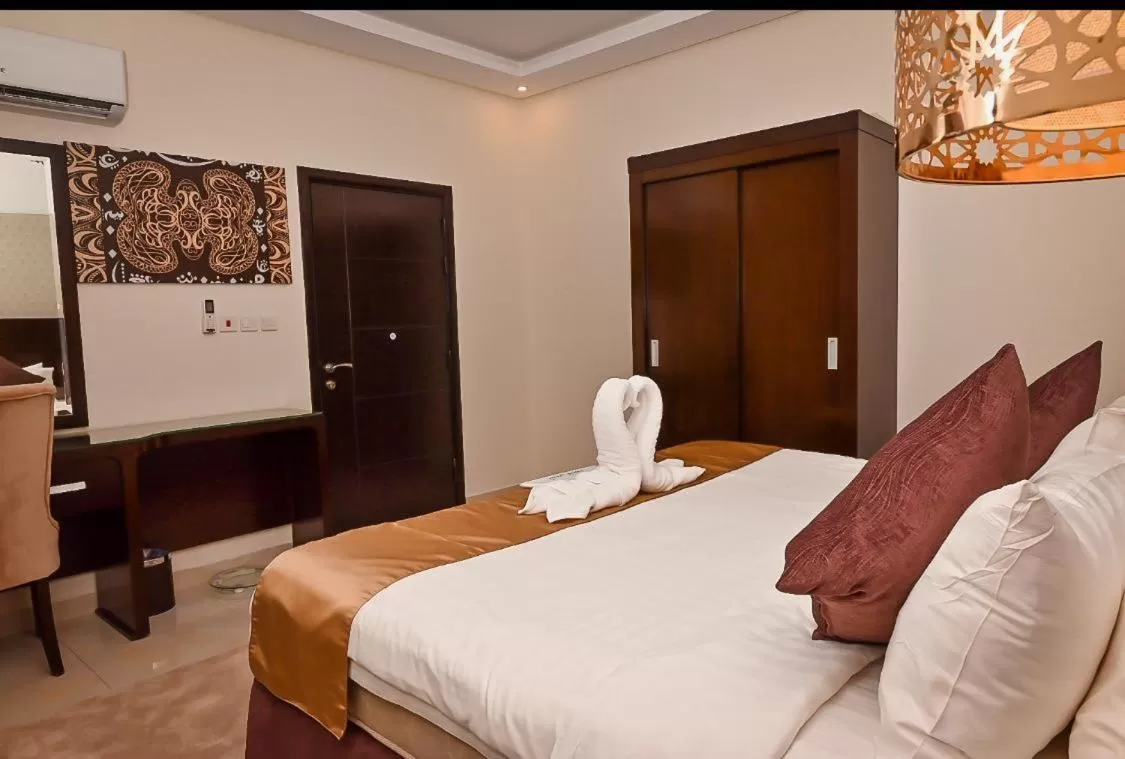 Bed in The Artisan Hotel-Suits