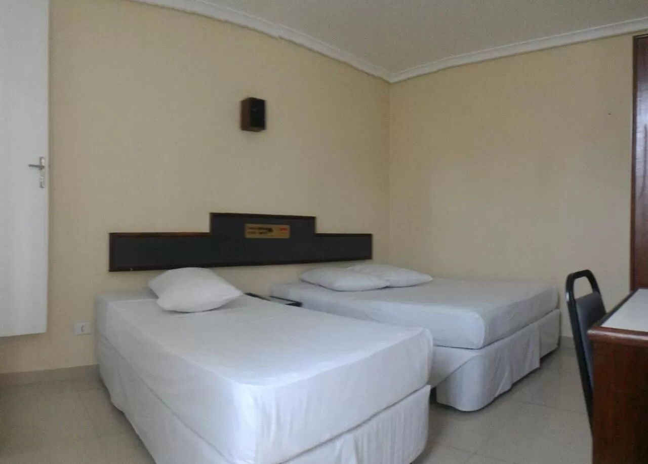 Bed in Hotel Estação Express