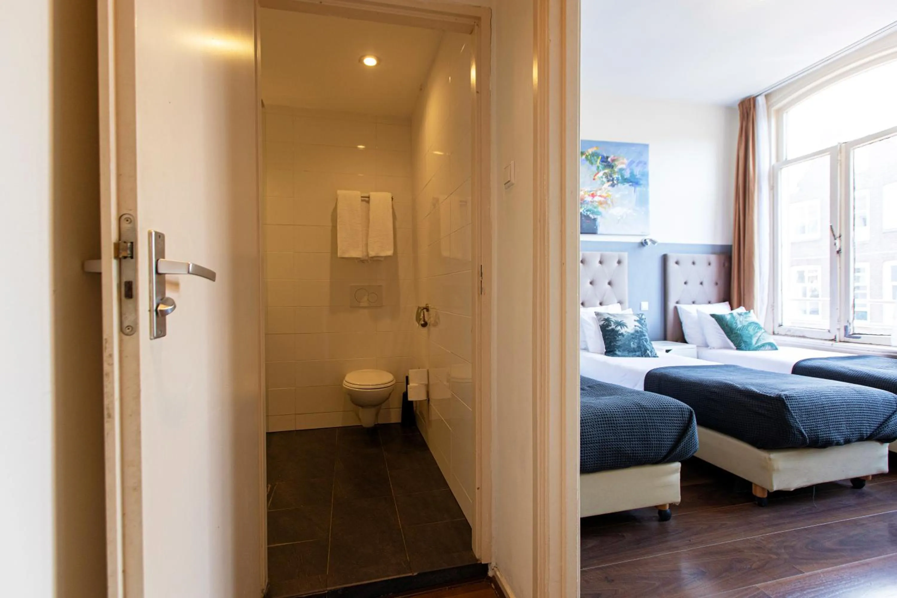 Bed in Quentin Arrive Hotel