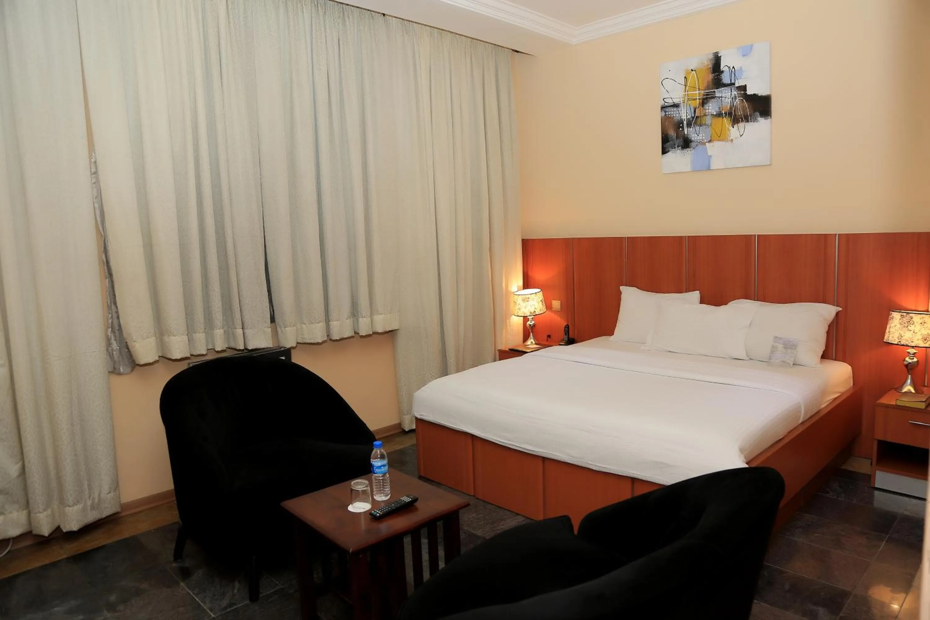 Photo of the whole room, Bed in Swiss International Mabisel Port Harcourt