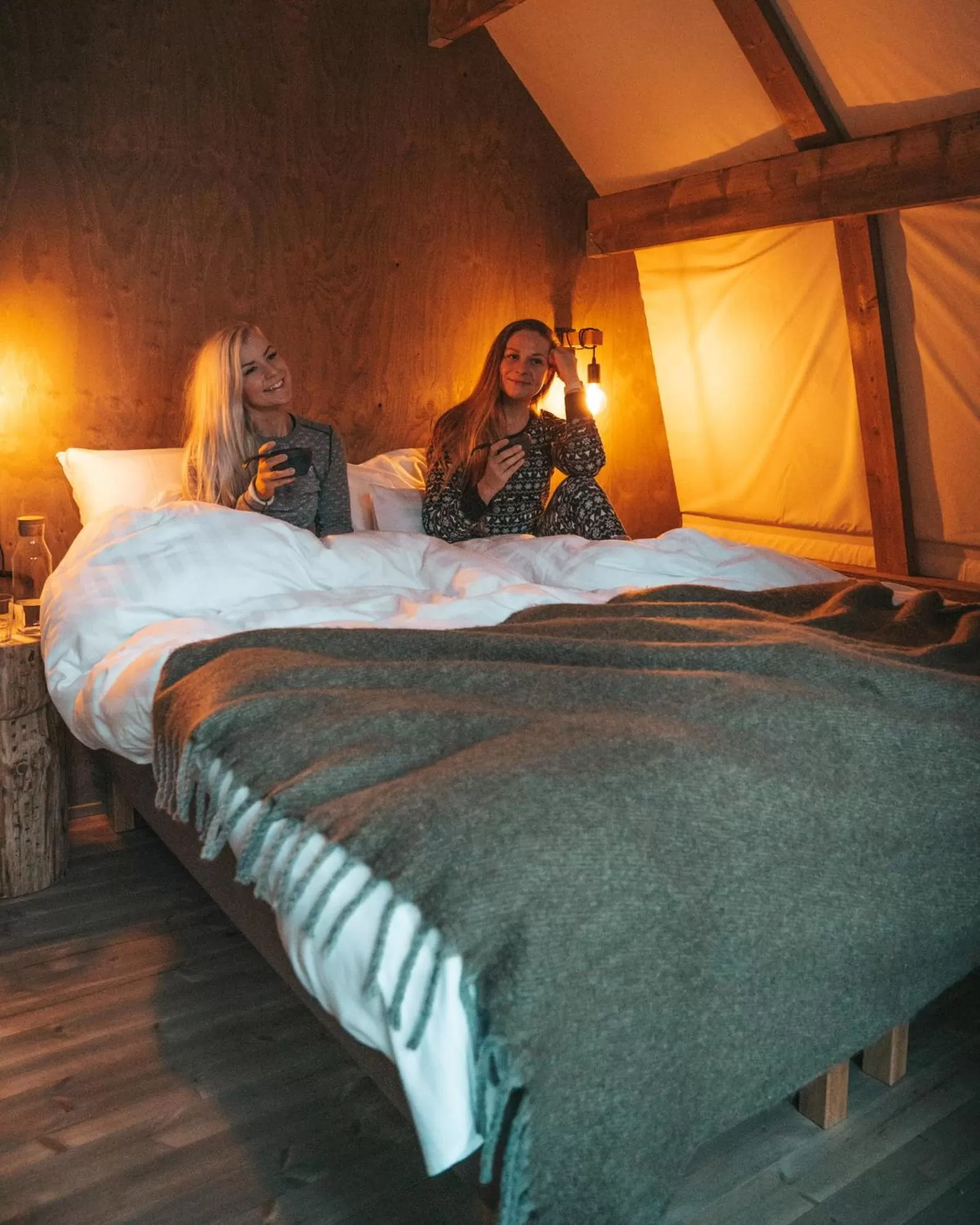 Bed in Haltia Lake Lodge nature boutique hotel & glamping