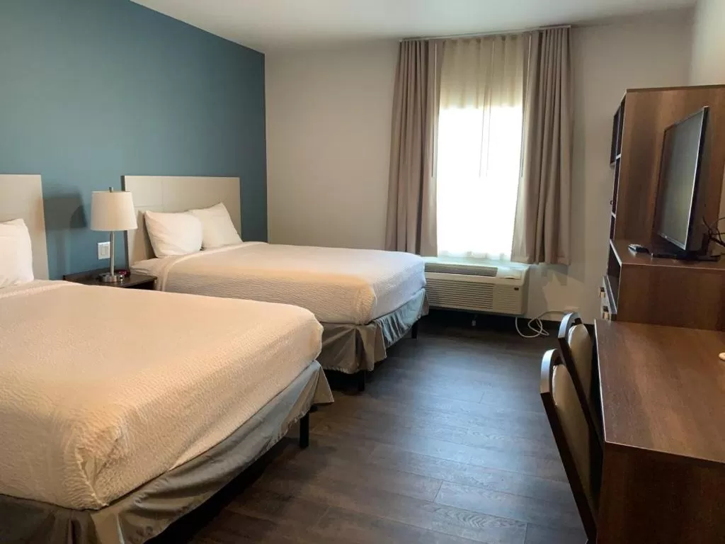 Bed in Candlewood Suites Pecos by IHG