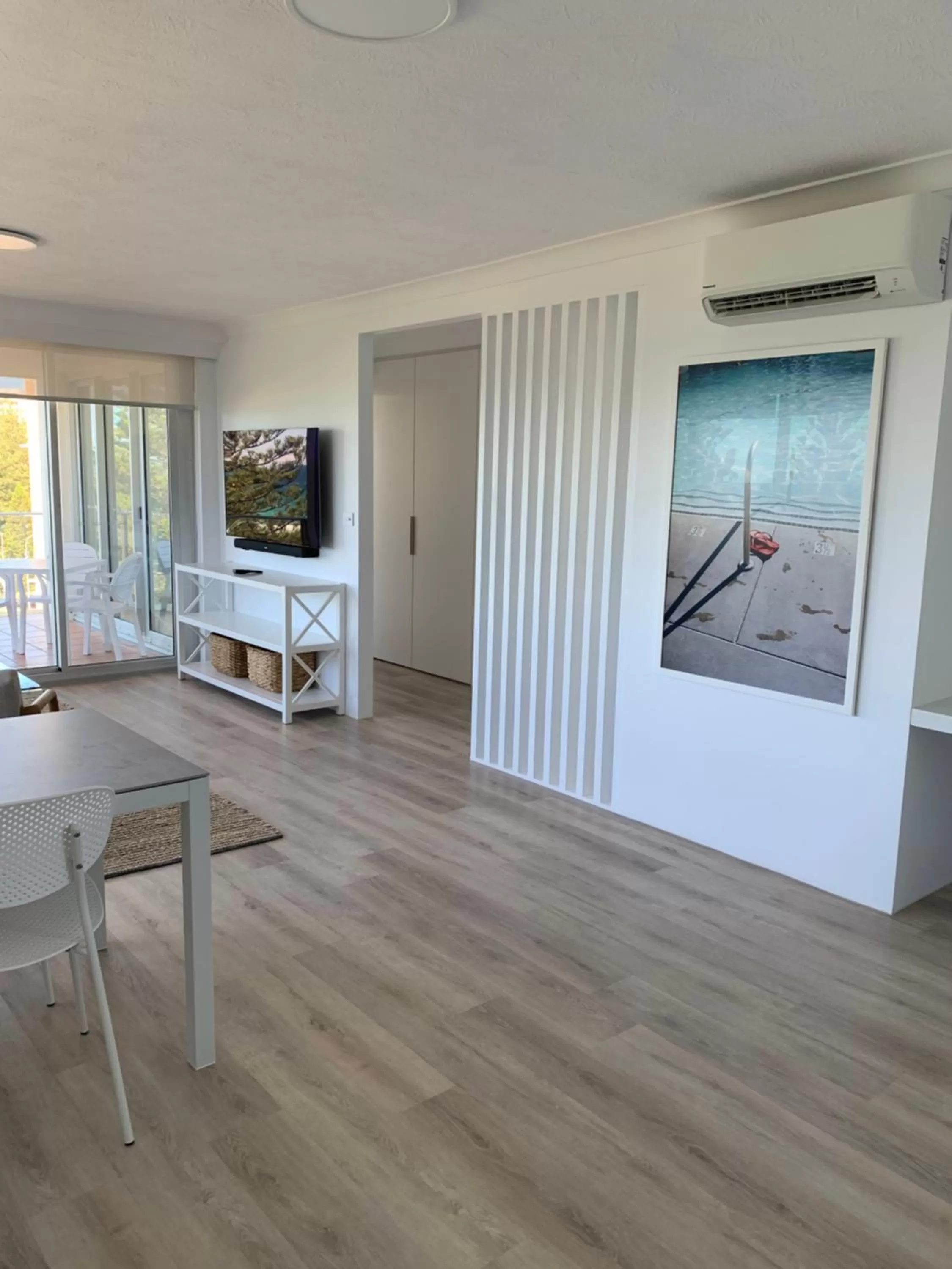 Living room in Pacific Regis Beachfront Holiday Apartments