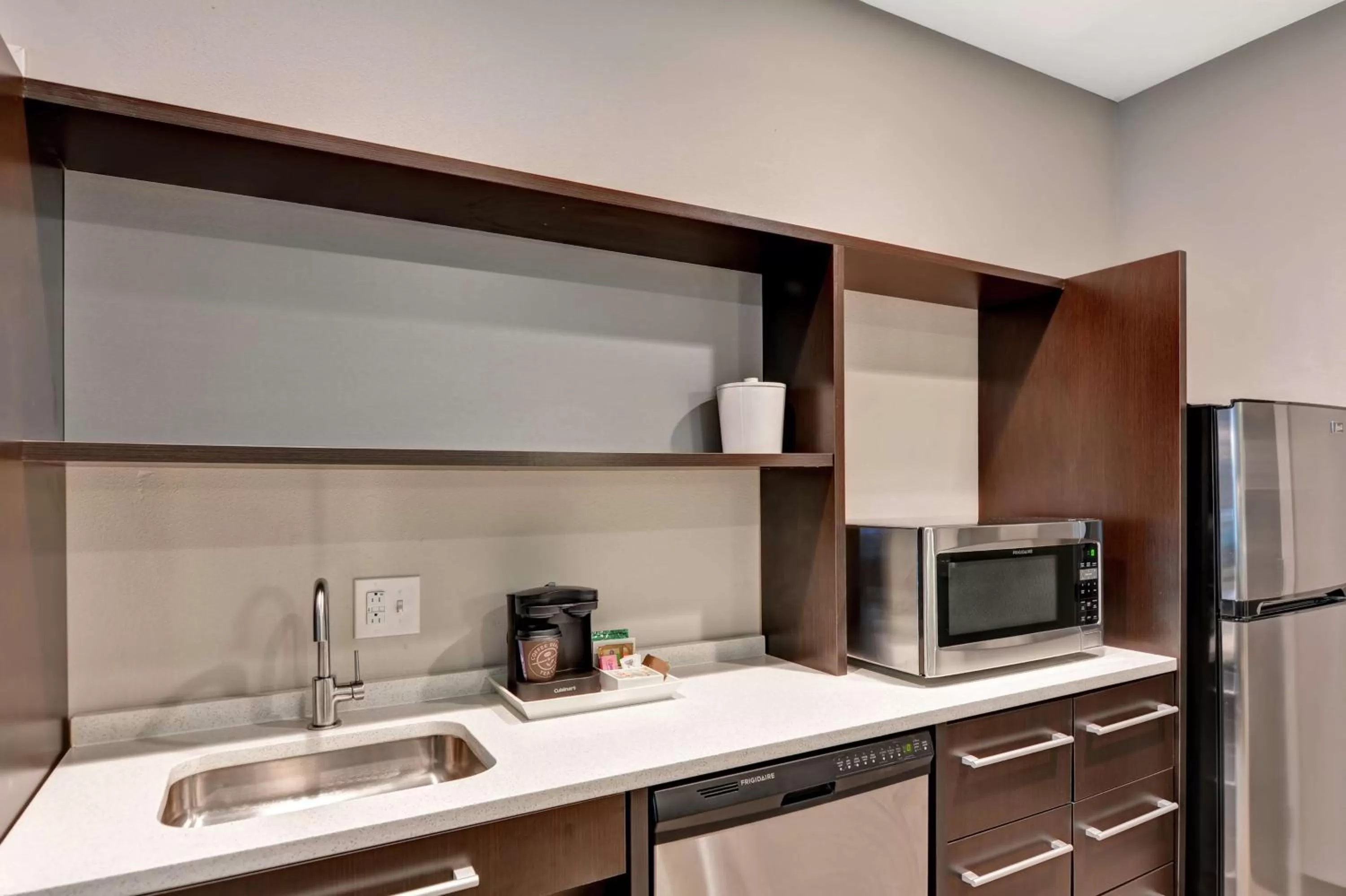 Kitchen or kitchenette in Home2 Suites Pensacola I-10 At North Davis Hwy