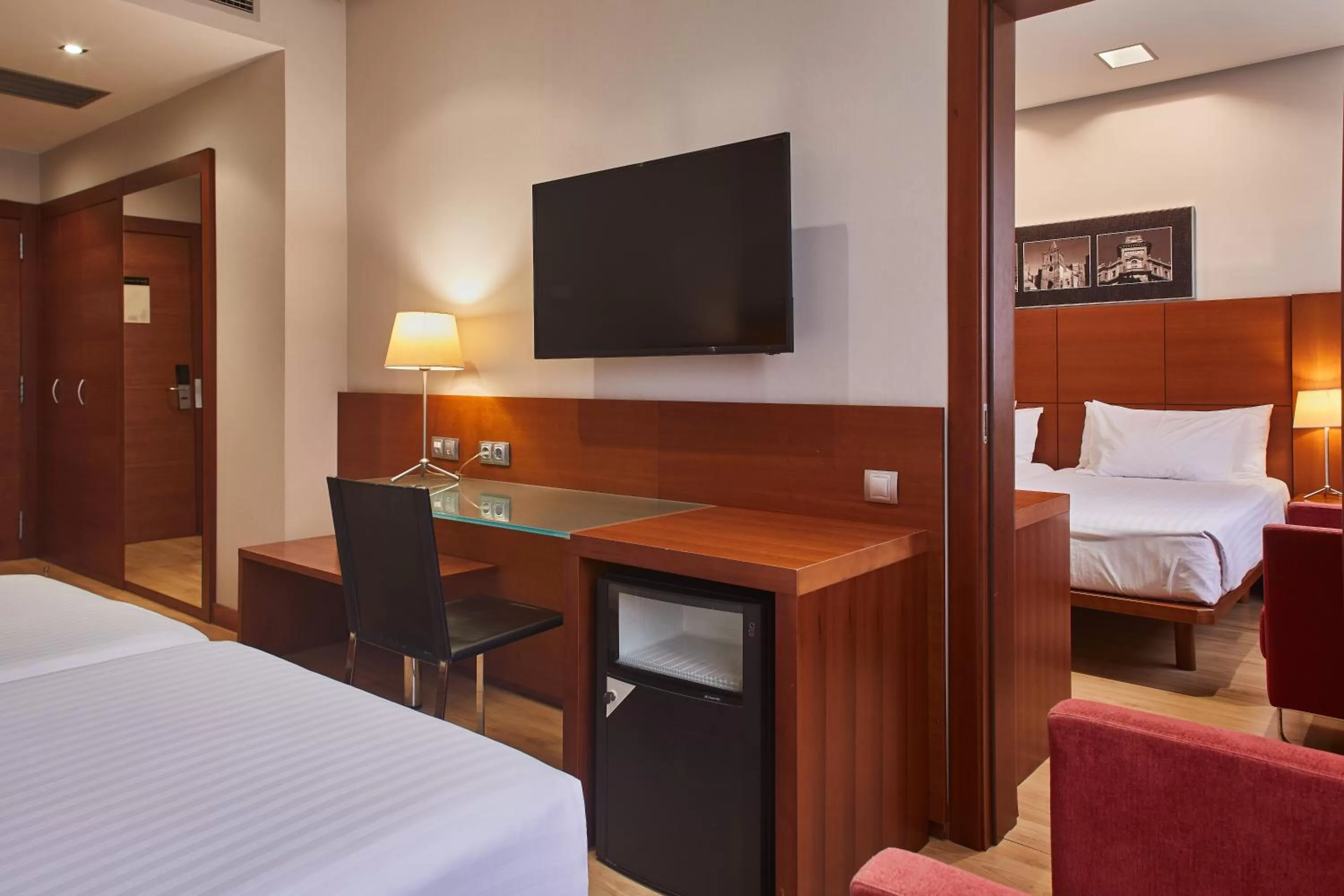 Seating area, Bed in Silken Ciudad Gijón