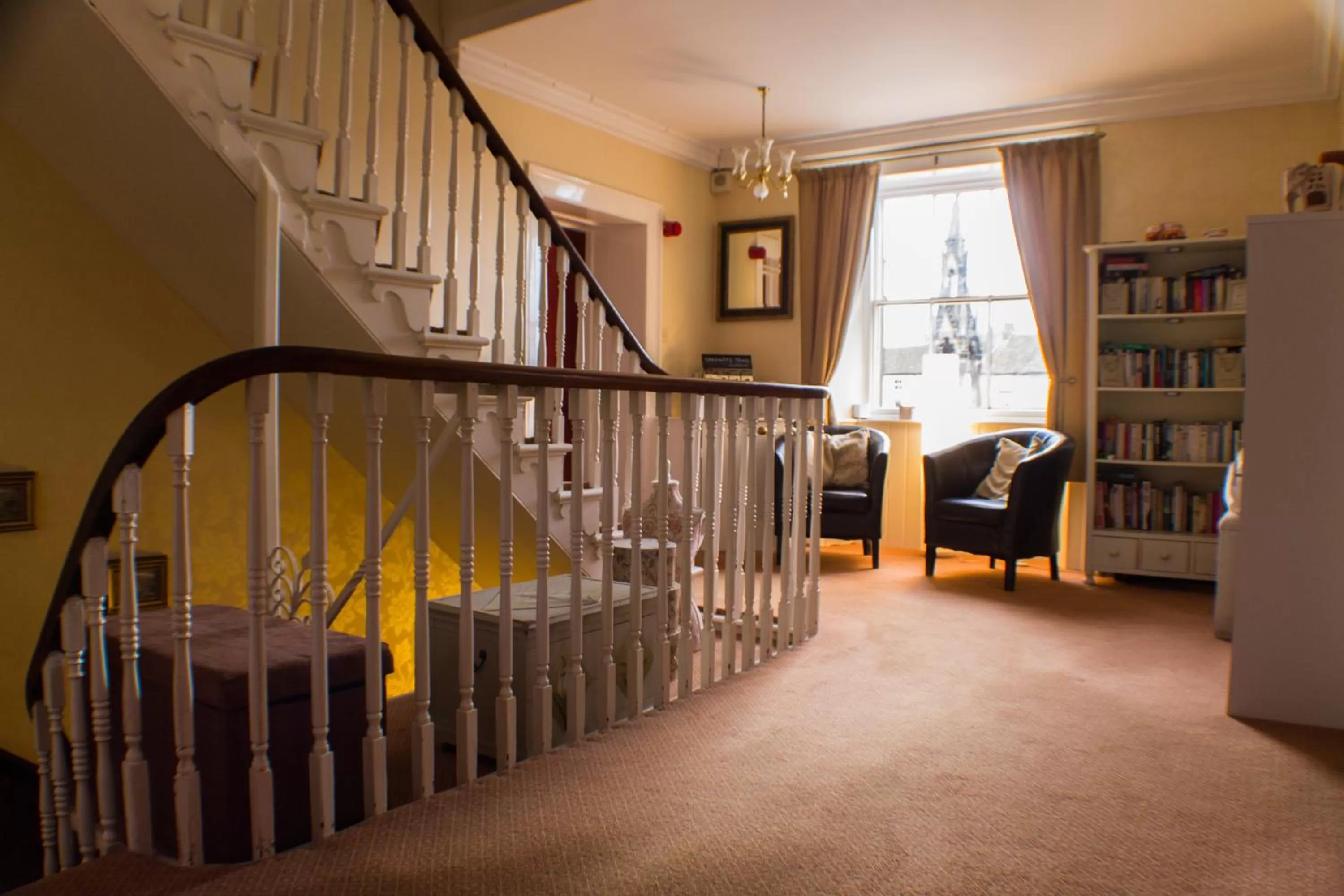 Communal lounge/ TV room in The Royal Oak Hotel