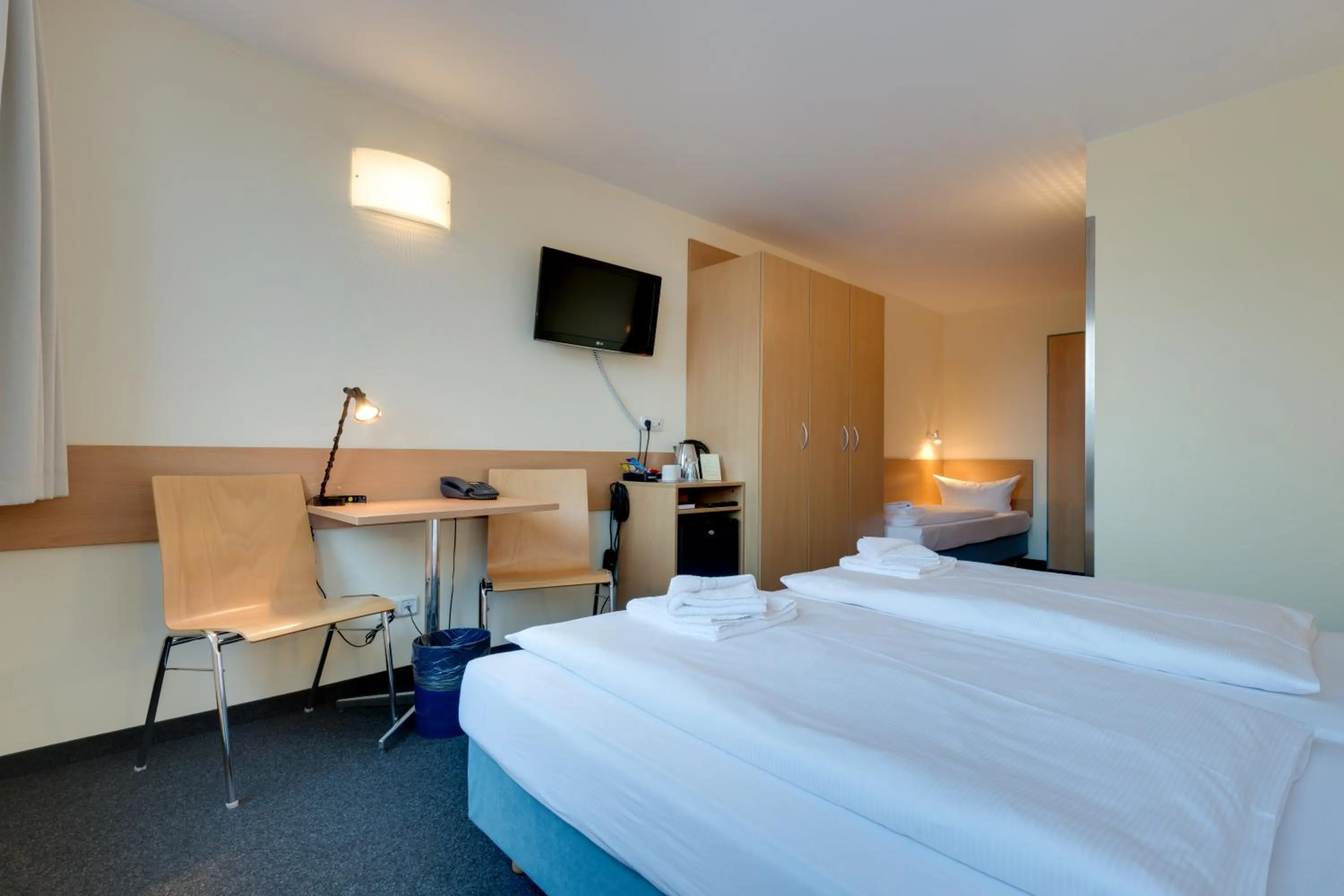 Photo of the whole room, Bed in Familienhotel Citylight