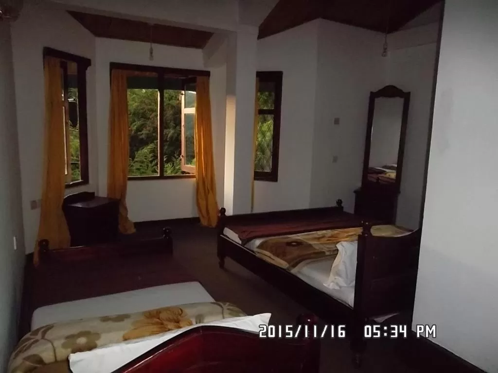 Bed in Panorama Accommodations Nuwara Eliya