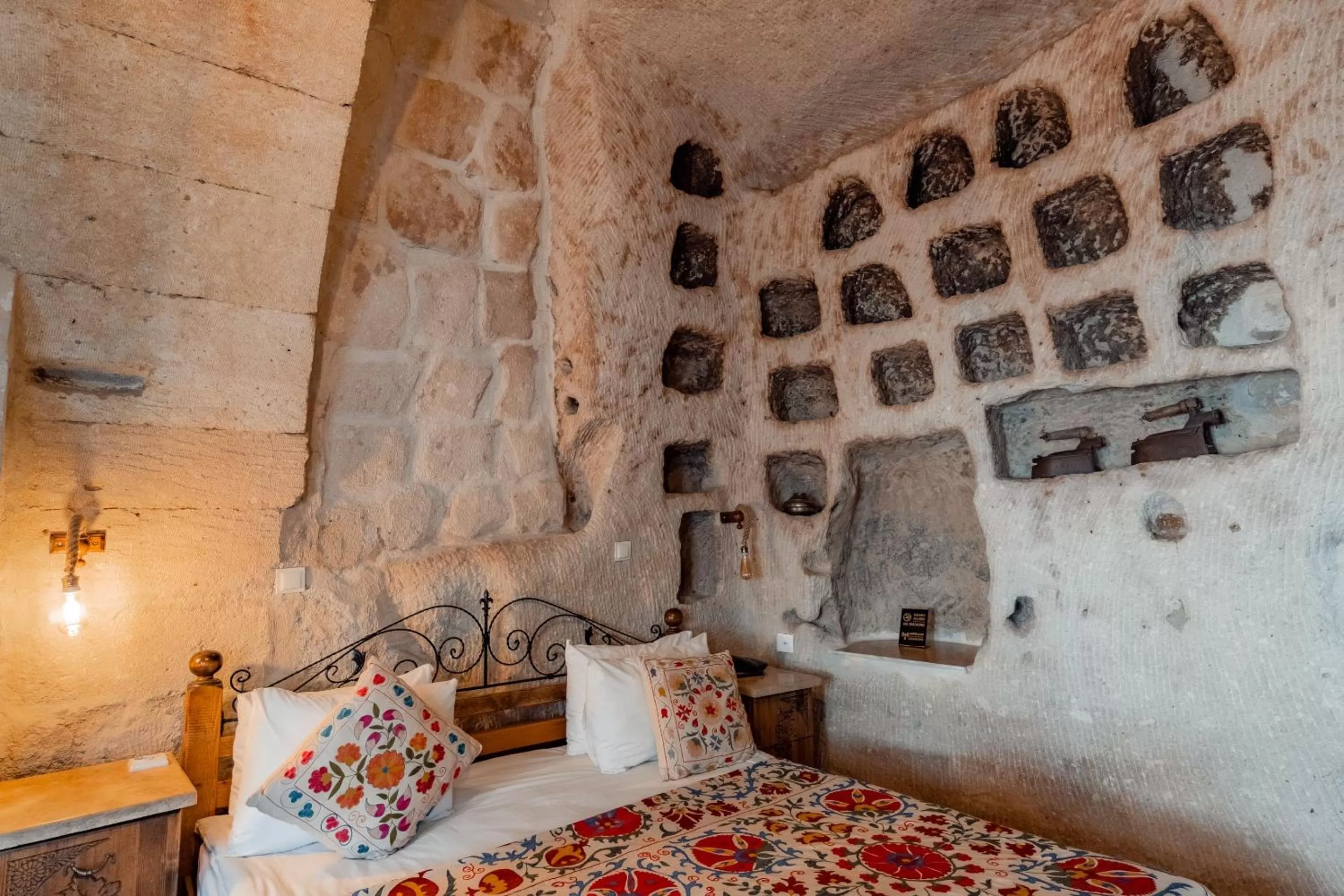 Bed in Amber Cave Suites