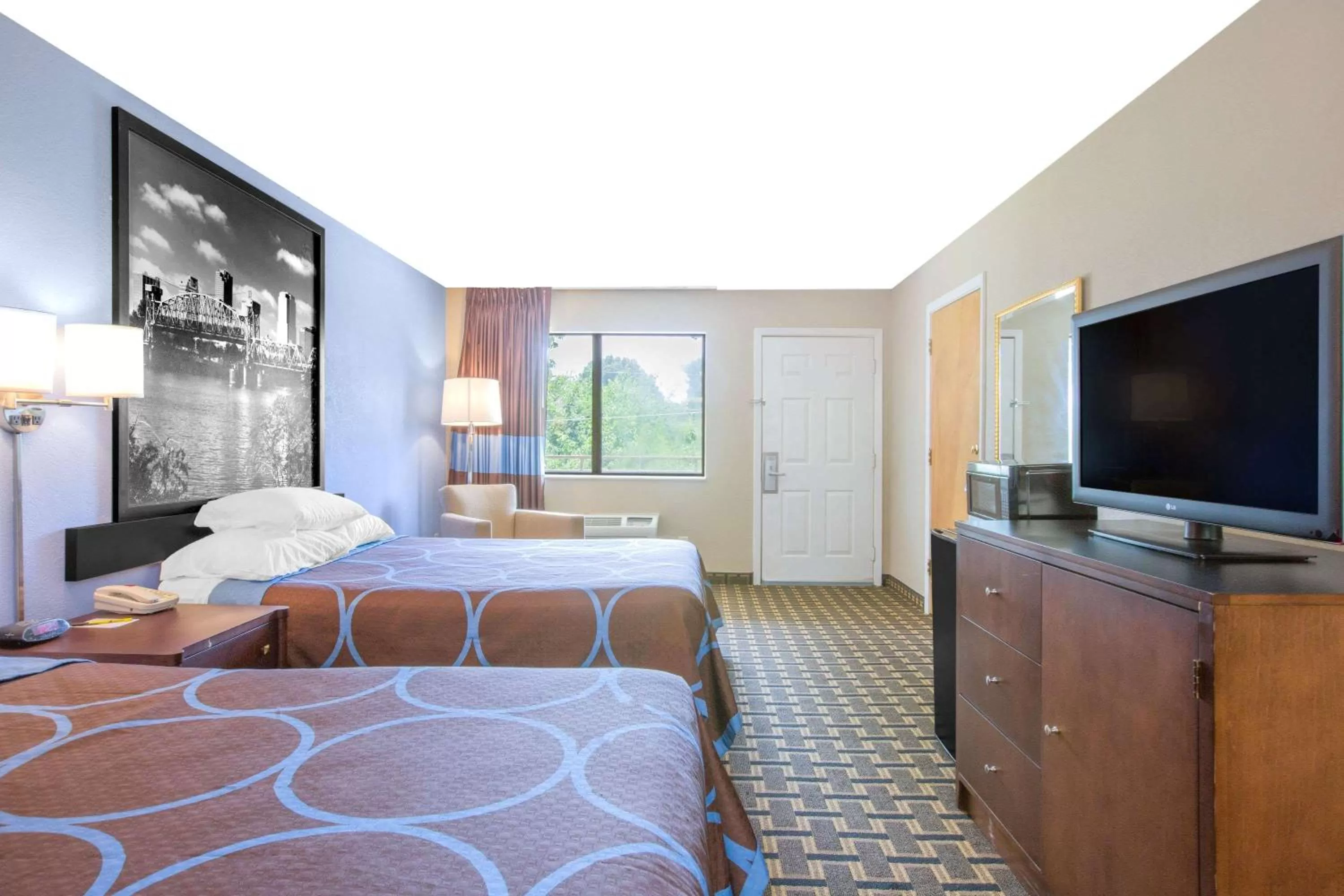 Photo of the whole room, Bed in Super 8 by Wyndham Brinkley