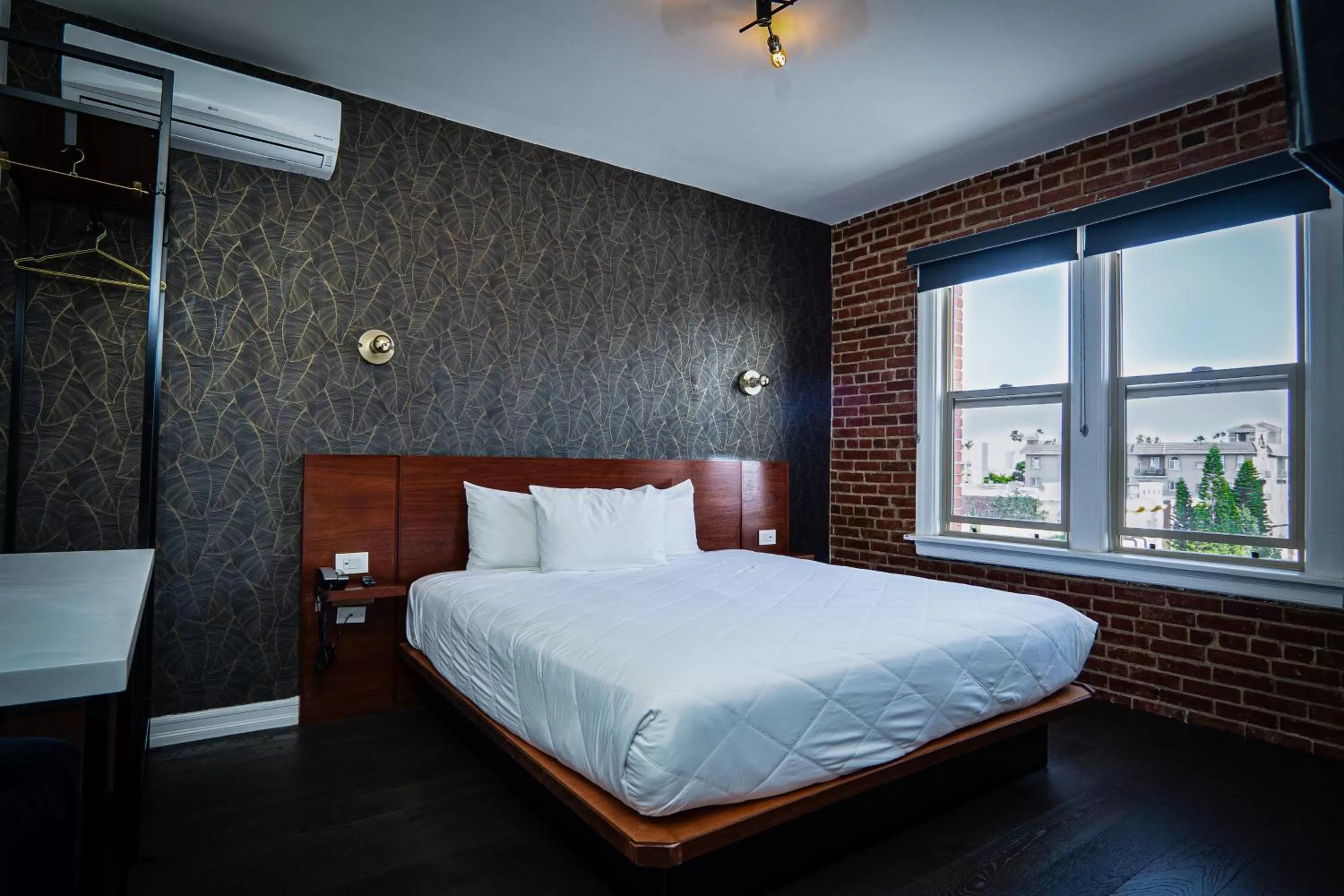 Bed in H by H Hospitality