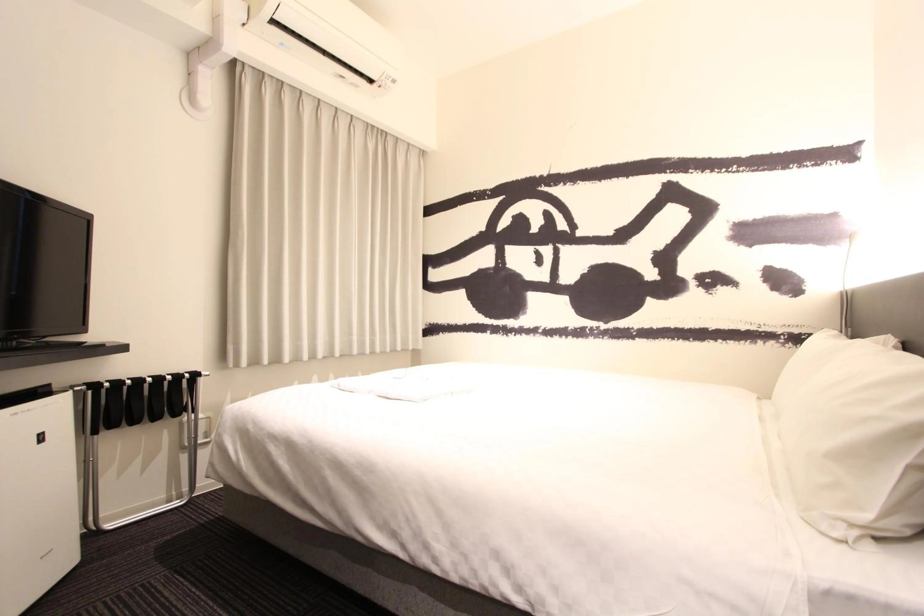 Bed in KOKO HOTEL Osaka Namba Ebisucho