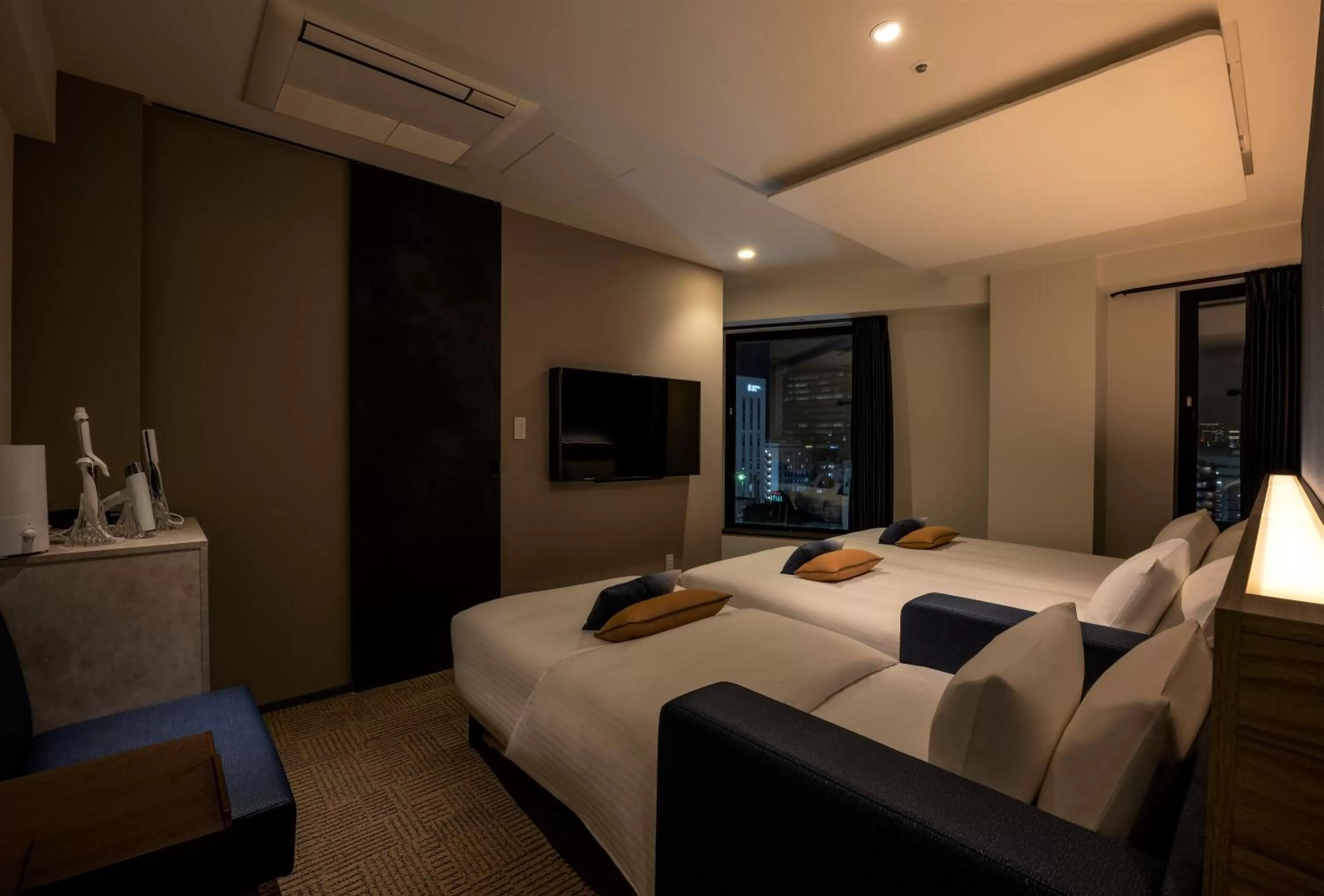 Photo of the whole room, Bed in HOTEL AMANEK Shinjuku Kabukicho