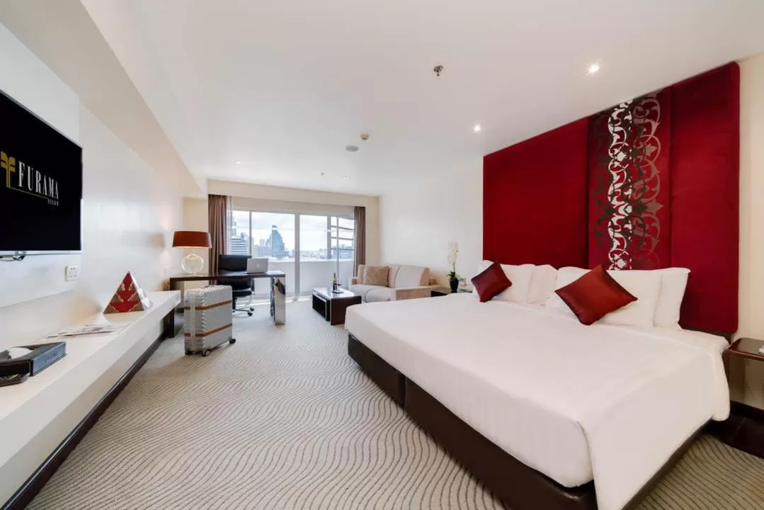 Bed in Furama Silom Hotel