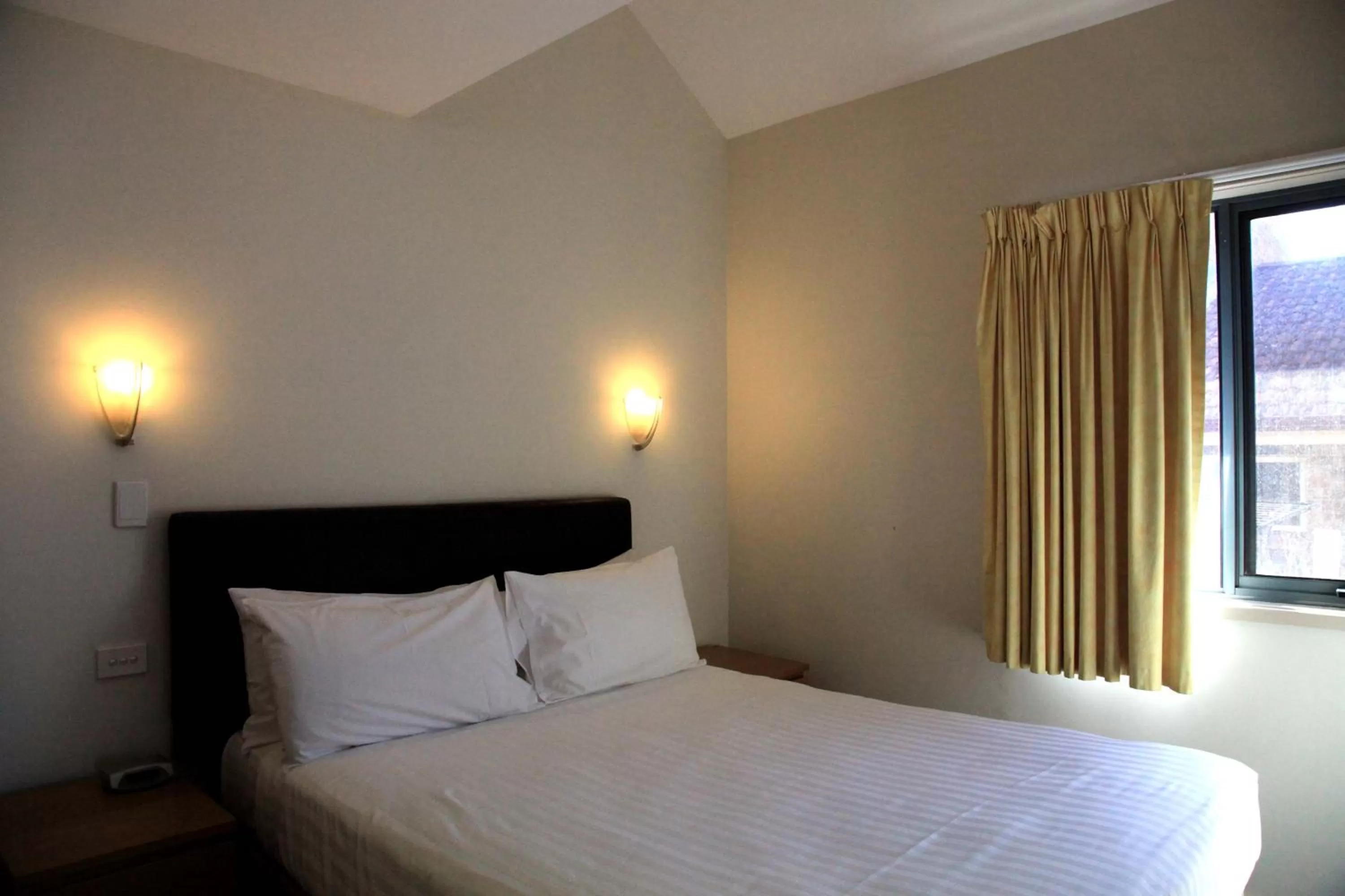 Bed in Travellers Motor Village