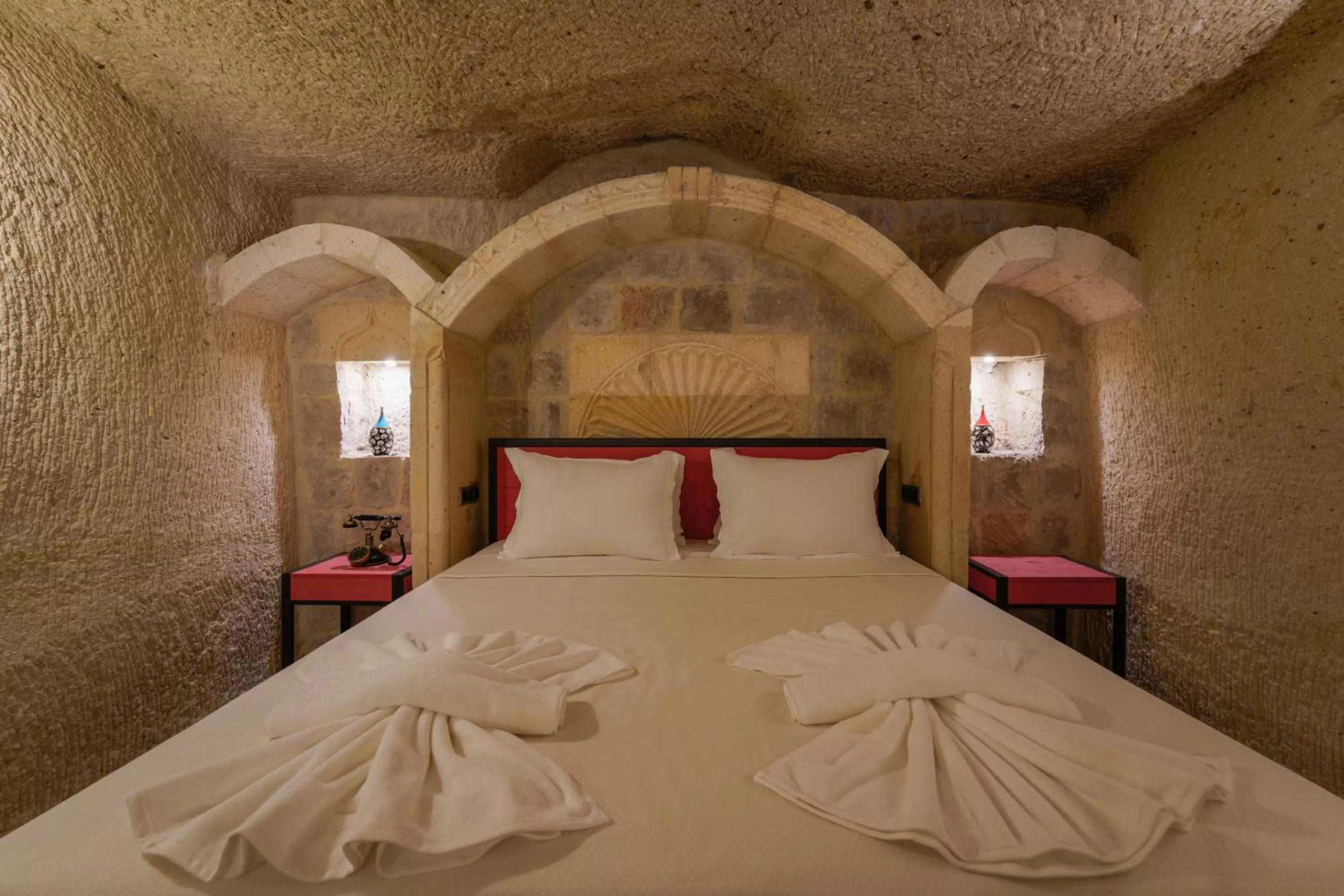Bed in The Niche Cave Hotel
