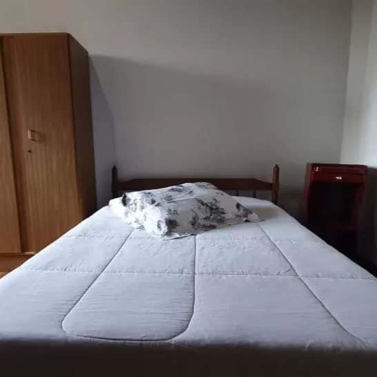 Bed in Apart Hotel Flomon