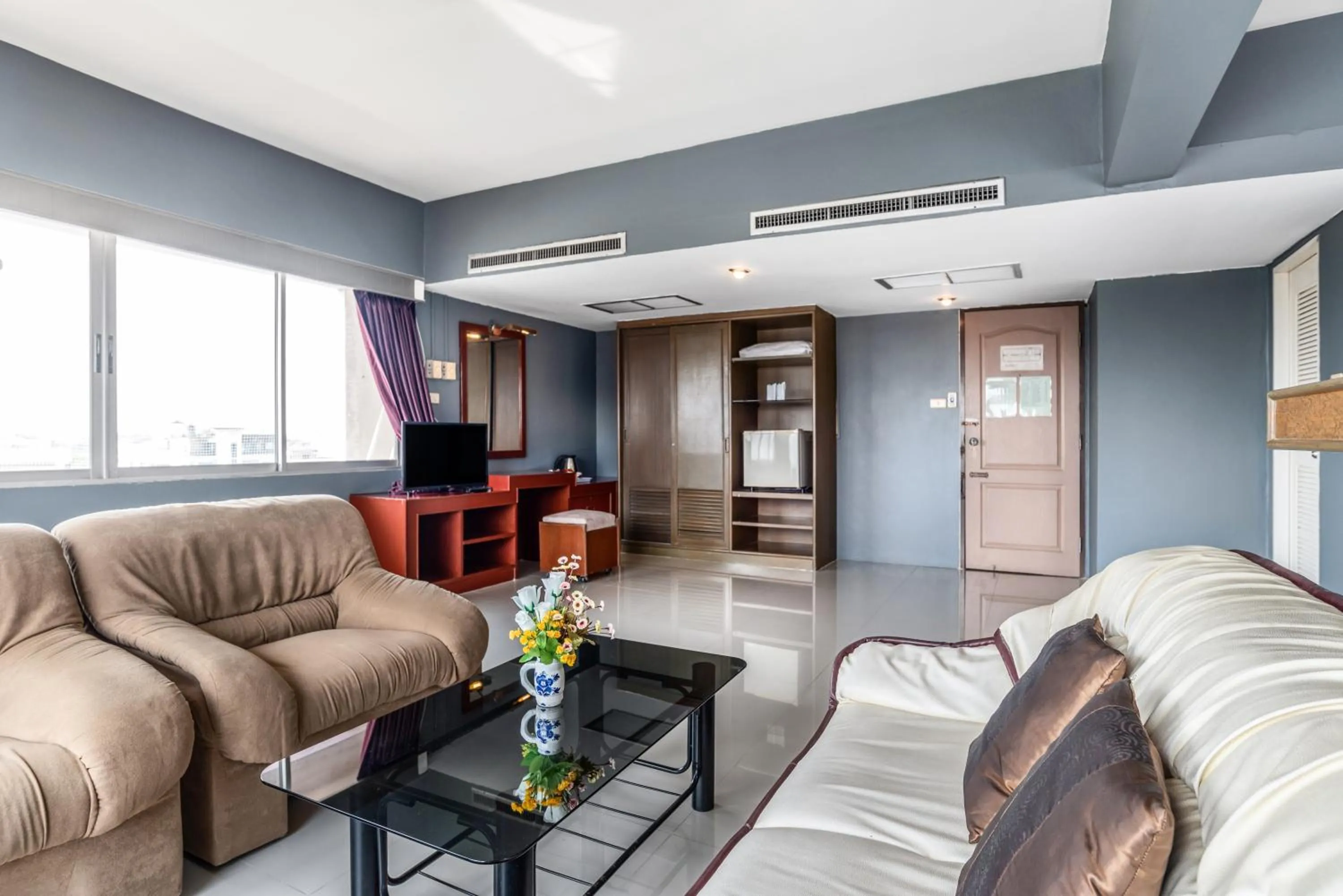 Living room in Ayothaya Riverside Hotel