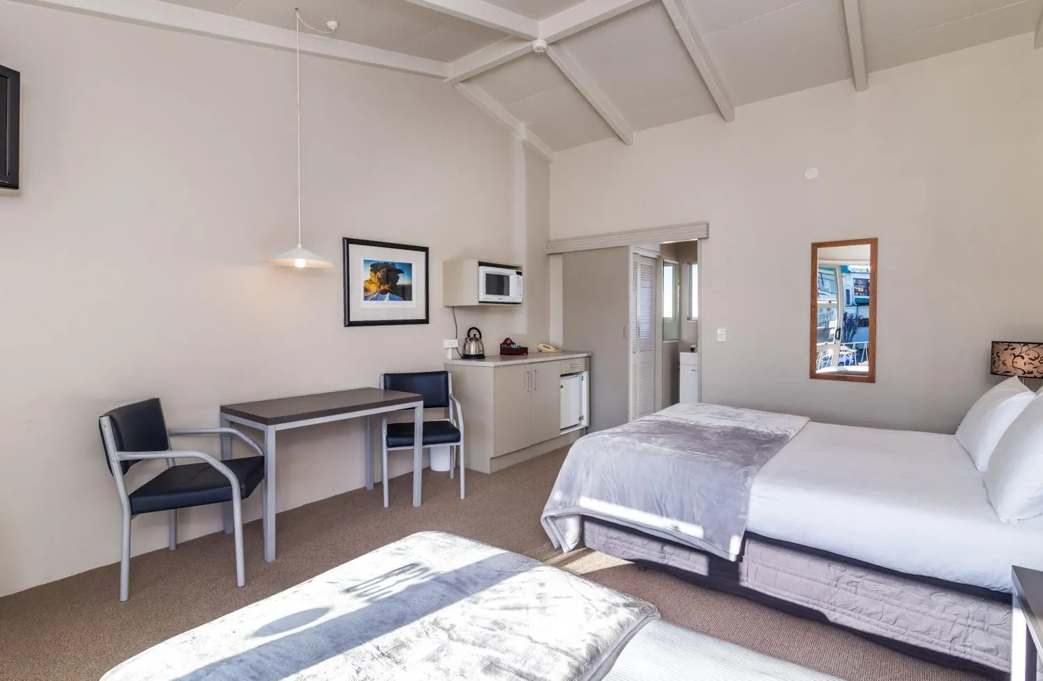 Bed in Twin Peaks Lakeside Inn