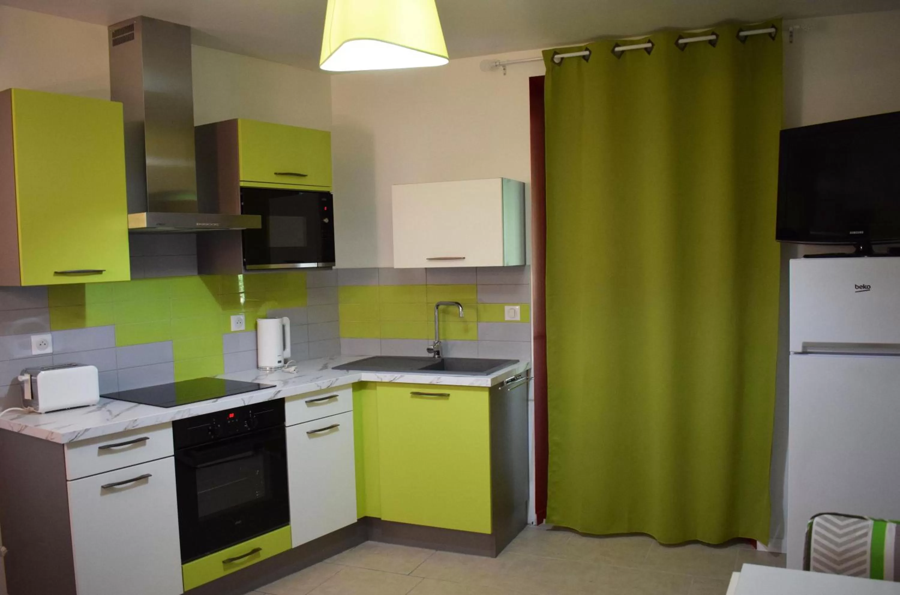 Kitchen or kitchenette in Art Home BnB