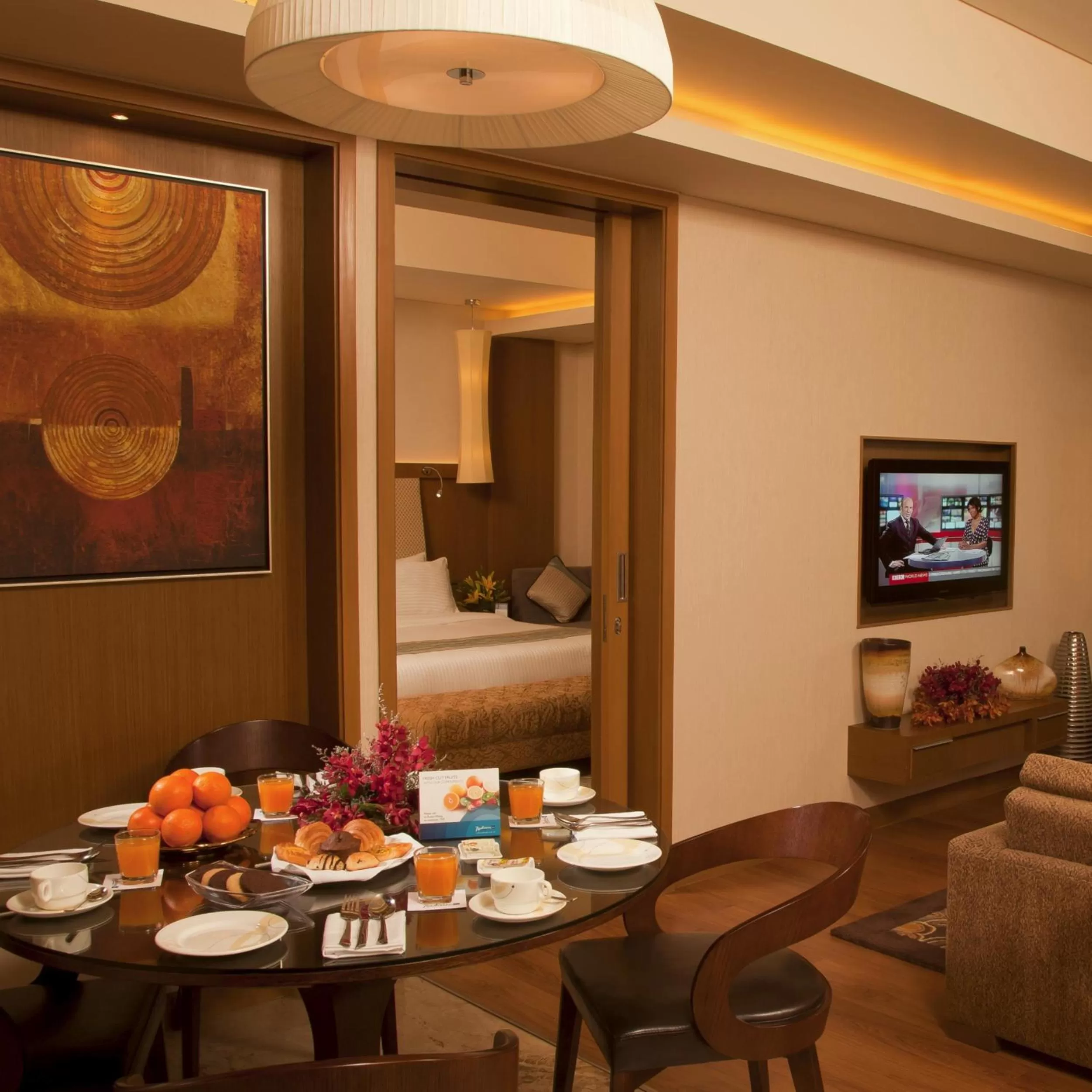 Dining area, Bed in Radisson Blu Hotel, Nagpur