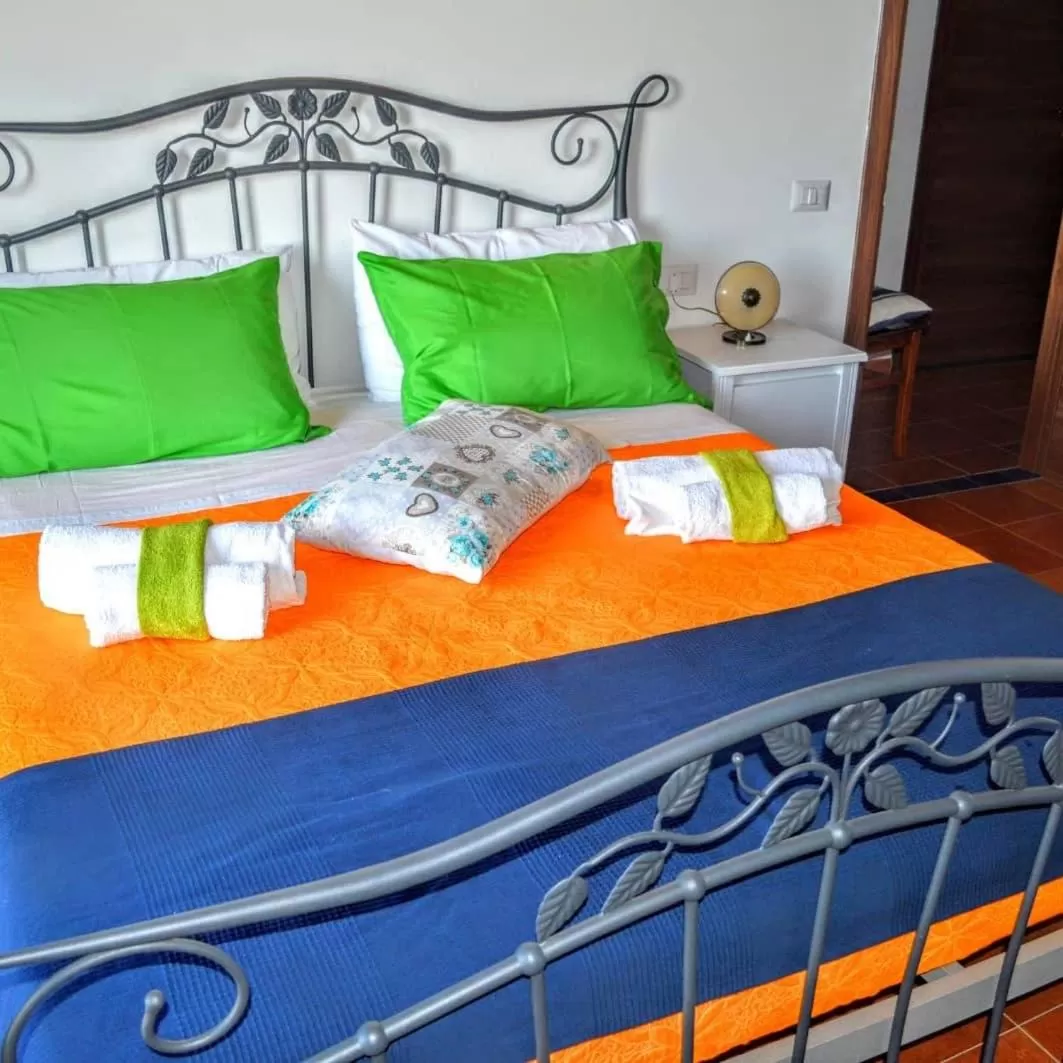 Bed in B&B Le Anthos
