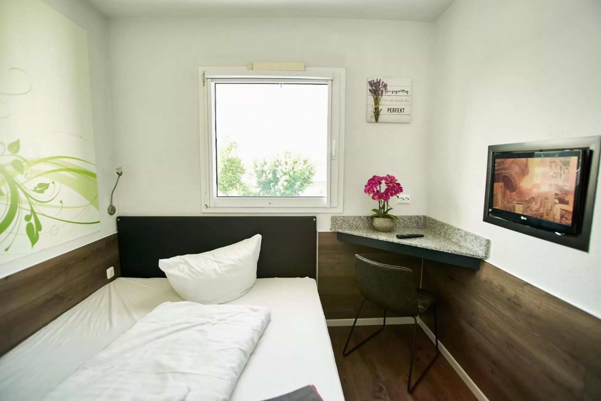 Photo of the whole room, Bed in Hotel City Inn