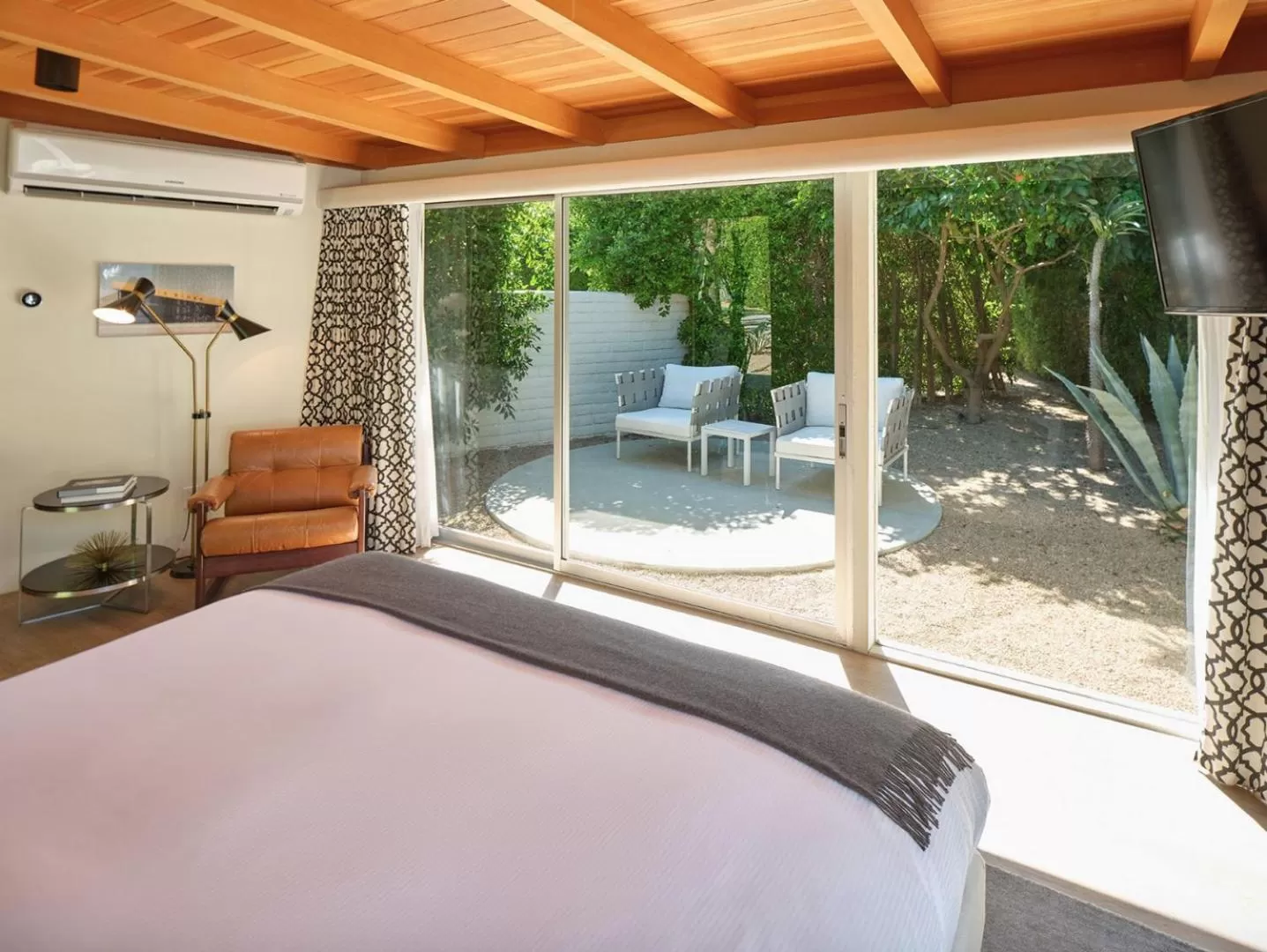Patio, Bed in L'Horizon Resort & Spa, Hermann Bungalows