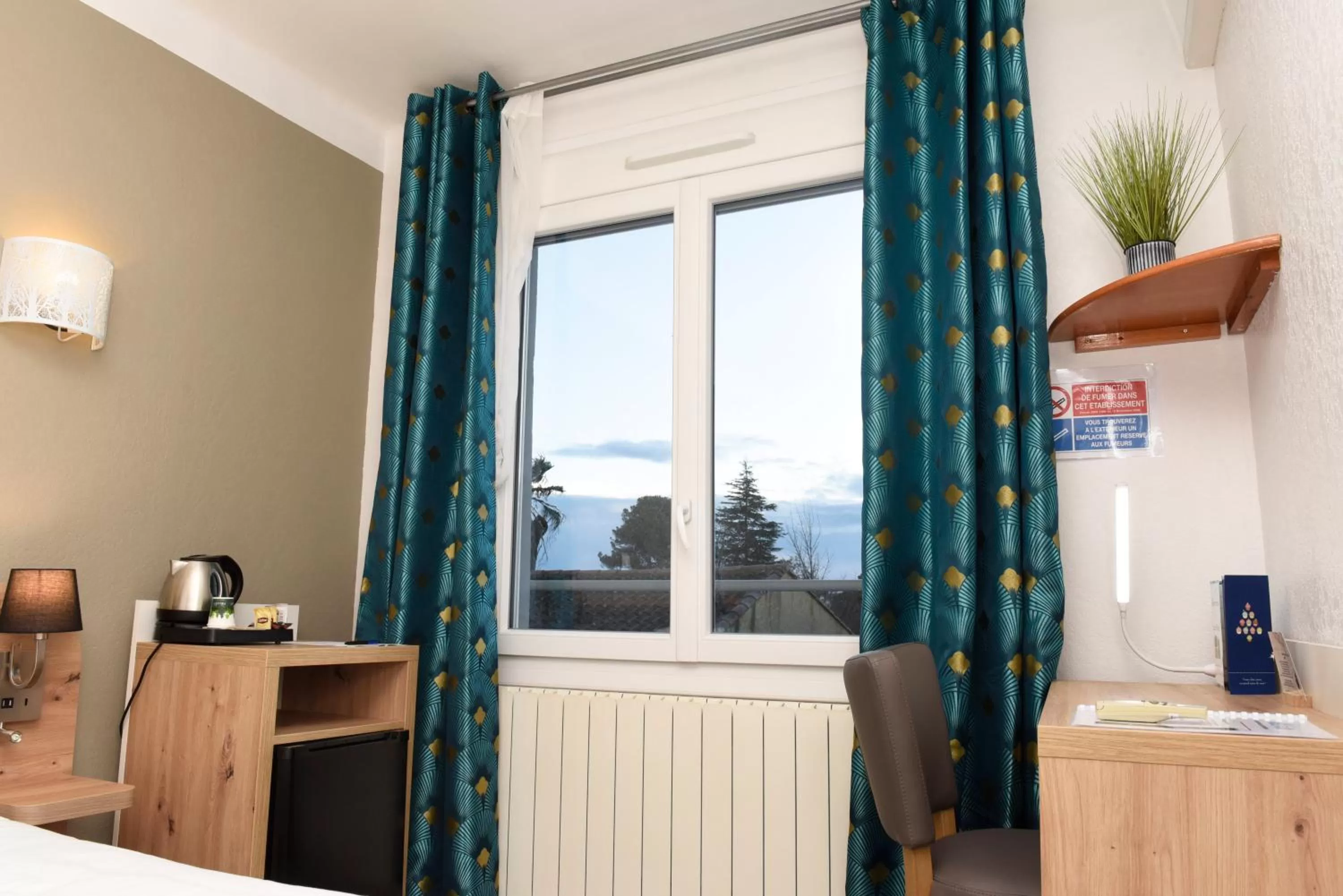 Photo of the whole room in Azur Hôtel