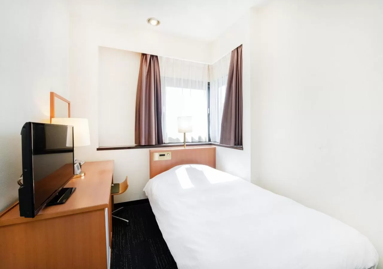 Bed in TKP Sunlife Hotel